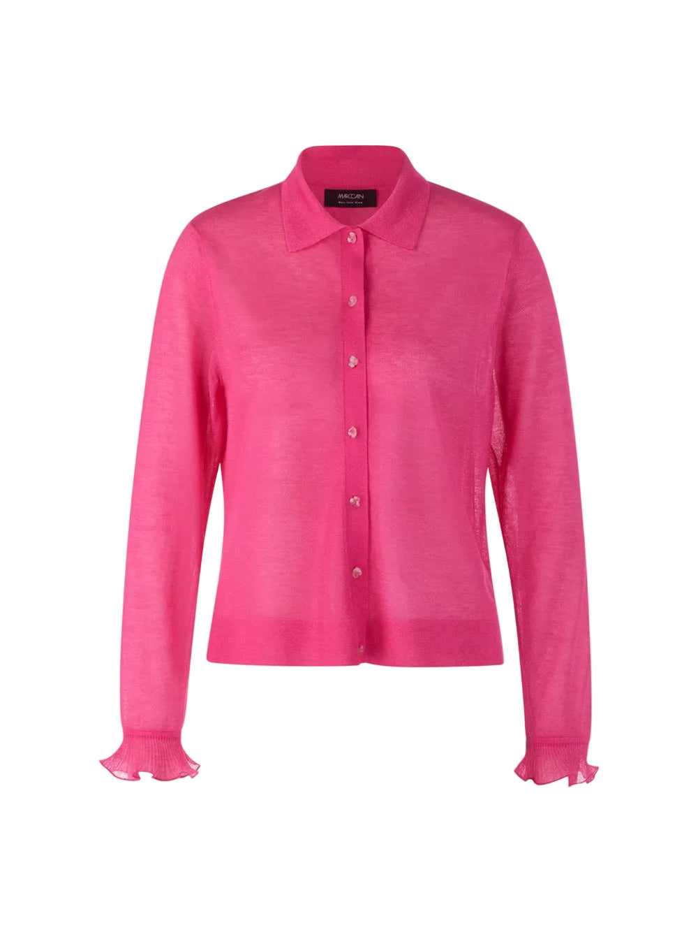 קרדיגן דק וקליל, עשוי סריג שקפקף מתערובת ויסקוזה ומשי רכה, בשילוב חוט לורקס למראה ברק עדין. גזרה ישרה, עם צווארון קלאסי, ושרוולים ארוכים בגימור מסולסל. סגירה באמצעות שורת כפתורים דקורטיביים עדינים בצורת פרח.הרכב: 73% ויסקוזה, 19% פוליאסטר, 8% משיהדוגמנית בגובה 1.79 ולובשת מידה 3 של מארק קיין