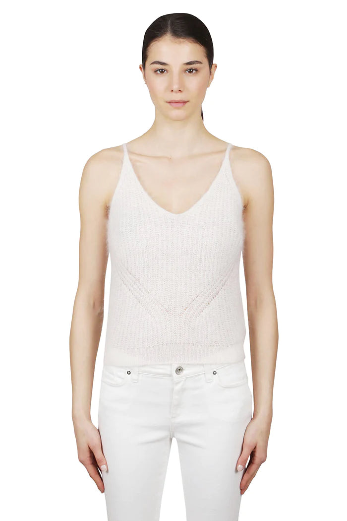 גופיה סרוגה עם דיטיילז פסיםהרכב: 70% מוהיר, 30% משיהדוגמנית בגובה 1.76 ולובשת מידה M