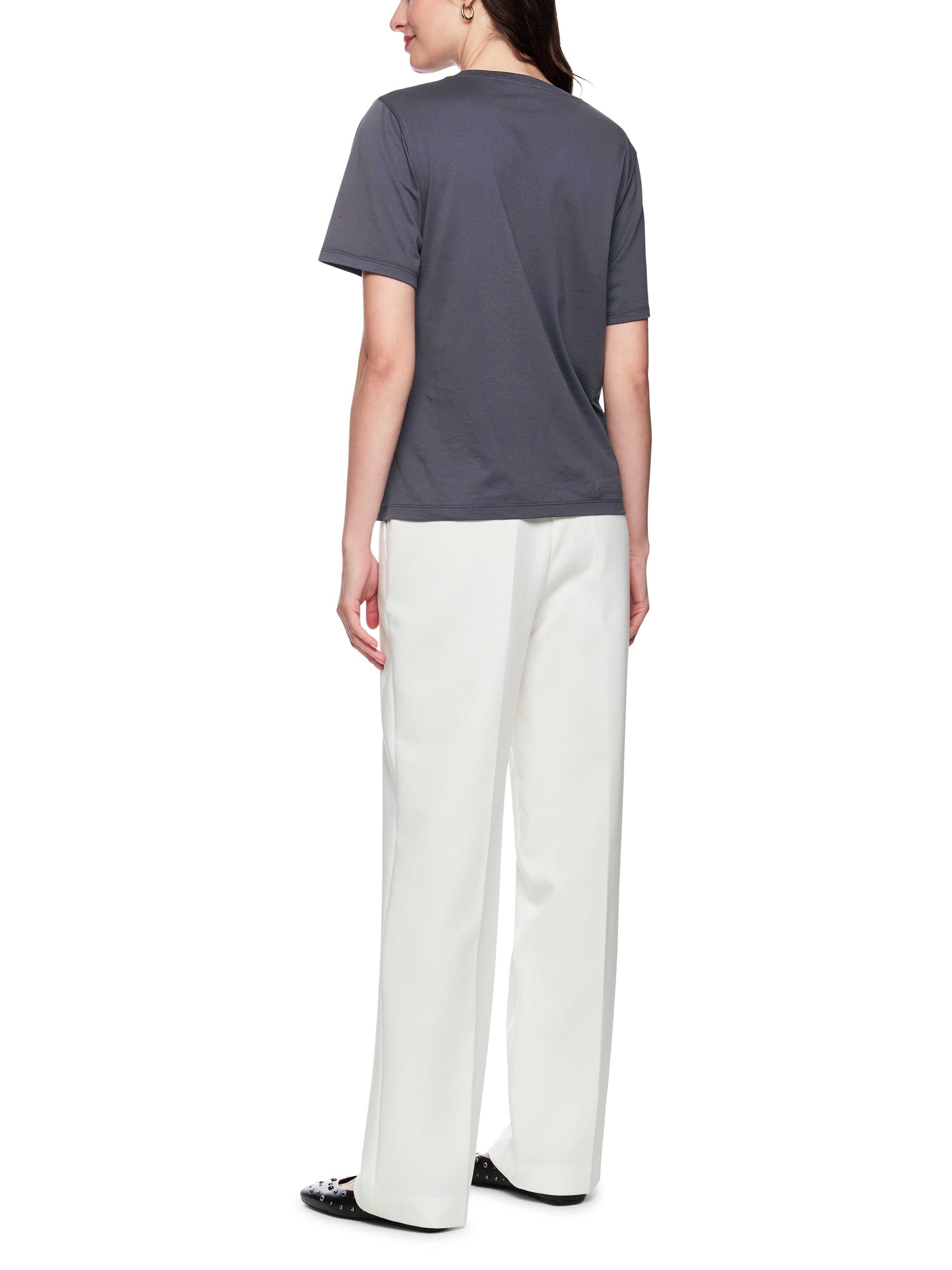 חולצת טי בגזרה רחבה עשויה כותנה עם הדפס הכולל ניטים בחזיתהרכב: 100% כותנההדוגמנית בגובה 1.79 ולובשת מידה 3 של מארק קיין