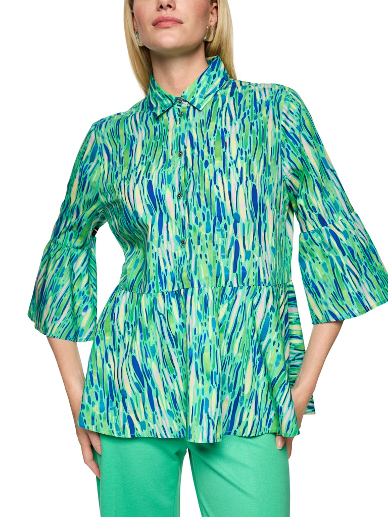 חולצה מכופתרת בגזרה רחבה ומחוייטת, עשויה כותנה קלה ונעימה. צללית נשית עם סיומת פפלום מתרחבת, שרוולי פעמון באורך ¾, צווארון קלאסי, וסגירת כפתורים לכל האורך.הרכב: 100% כותנההדוגמנית בגובה 1.79 ולובשת מידה 3 של מארק קיין