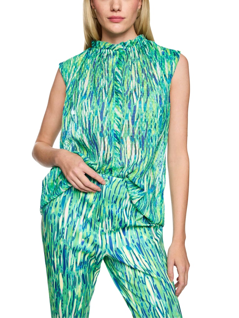 חולצה ללא שרוולים בגזרה רחבה, מבד קליל ואוורירי. עם צווארון קולר בגימור מסולסל, וסגירת כפתורים לכל האורך.הרכב: 100% פוליאסטרהדוגמנית בגובה 1.79 ולובשת מידה 3 של מארק קיין