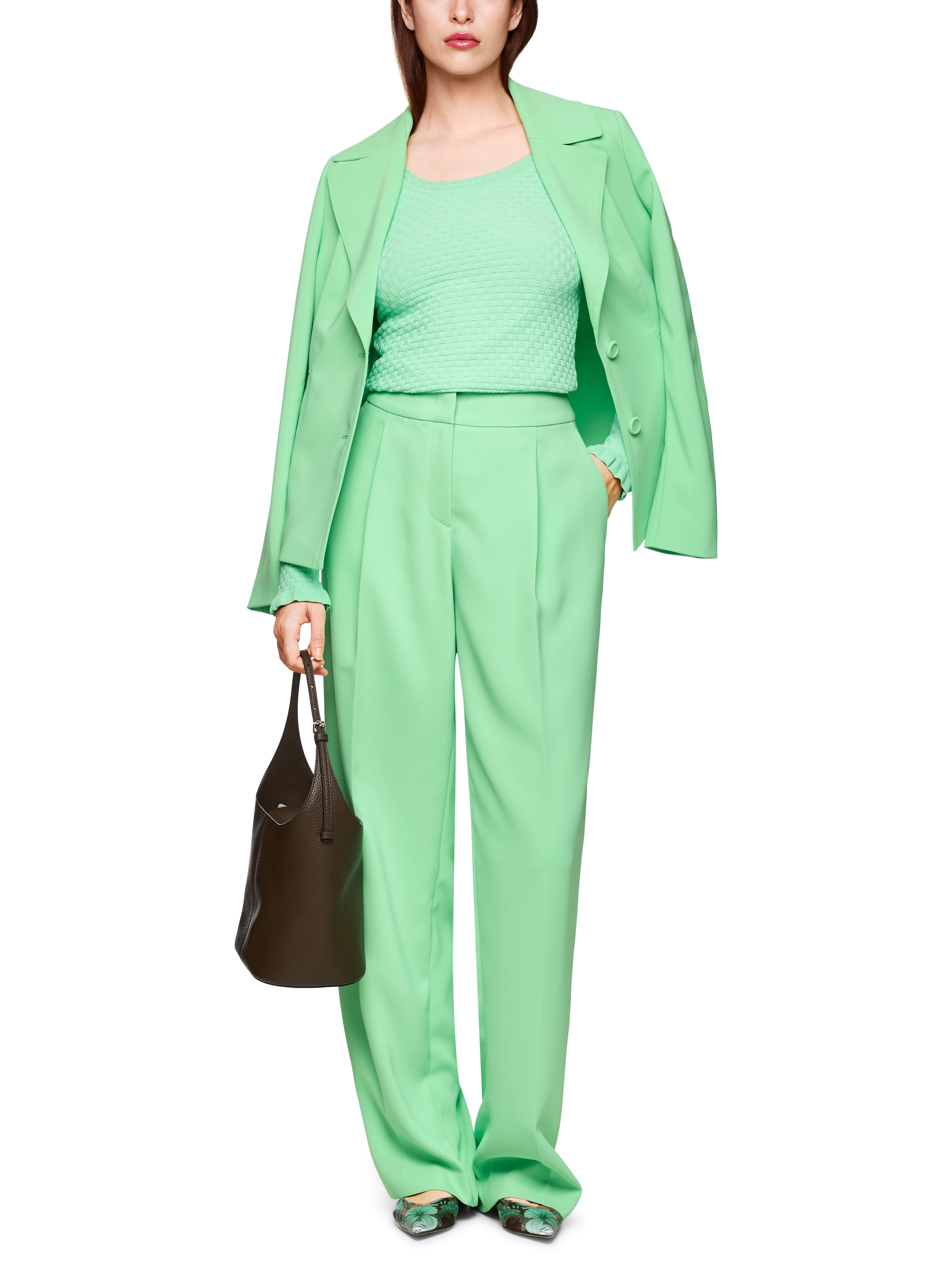 מכנסיים מחוייטים בגזרה גבוהההרכב: 97% פוליאסטר, 3% אלסטןהדוגמנית בגובה 1.79 ולובשת מידה 3 של מארק קיין