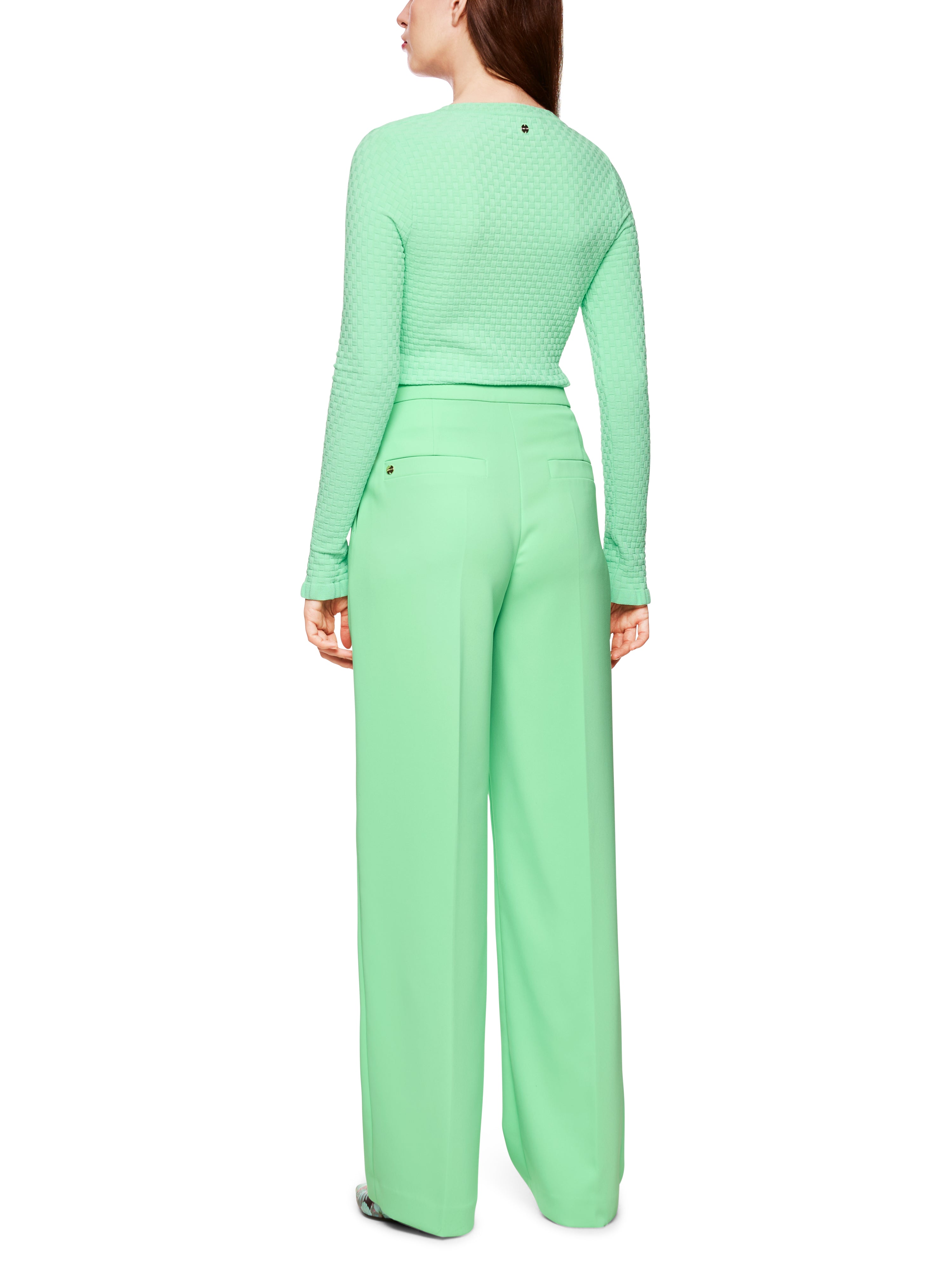 מכנסיים מחוייטים בגזרה גבוהההרכב: 97% פוליאסטר, 3% אלסטןהדוגמנית בגובה 1.79 ולובשת מידה 3 של מארק קיין