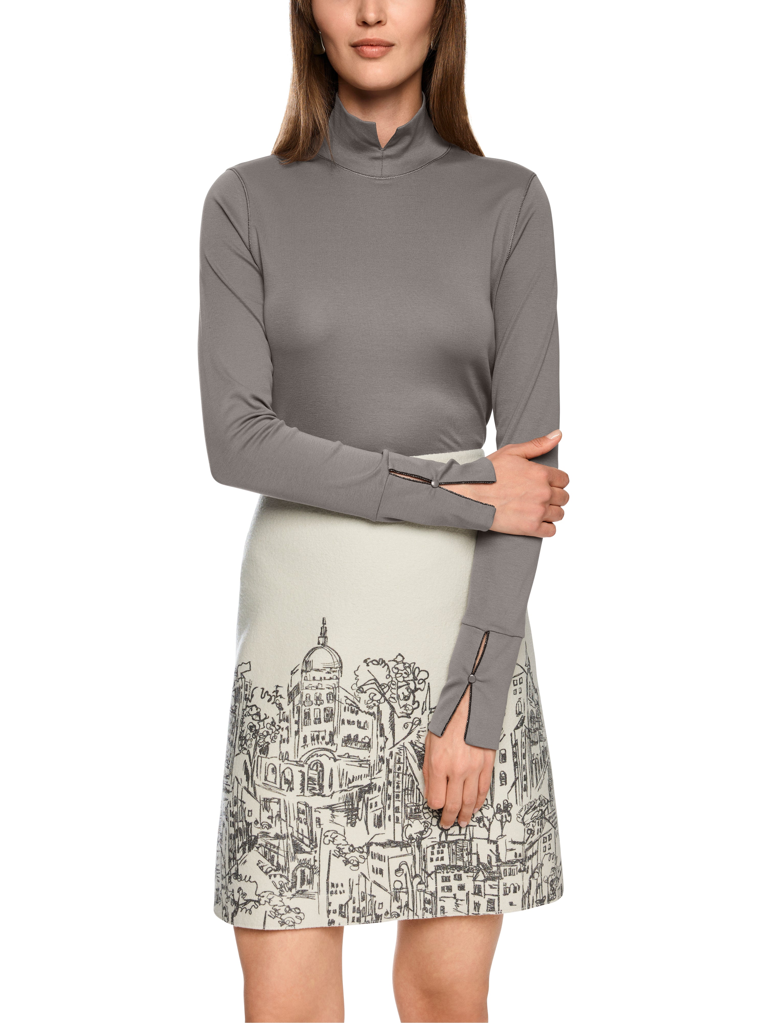 חצאית בגזרה ישרה עם הדפס אורבני ציורי, רוכסן נסתר בגב ורפידה פנימיתעיצוב מינימליסטי ונקיהרכב בד: 100% צמר חדשהדוגמנית בגובה 1.79 ולובשת מידה 3 של מארק קיין