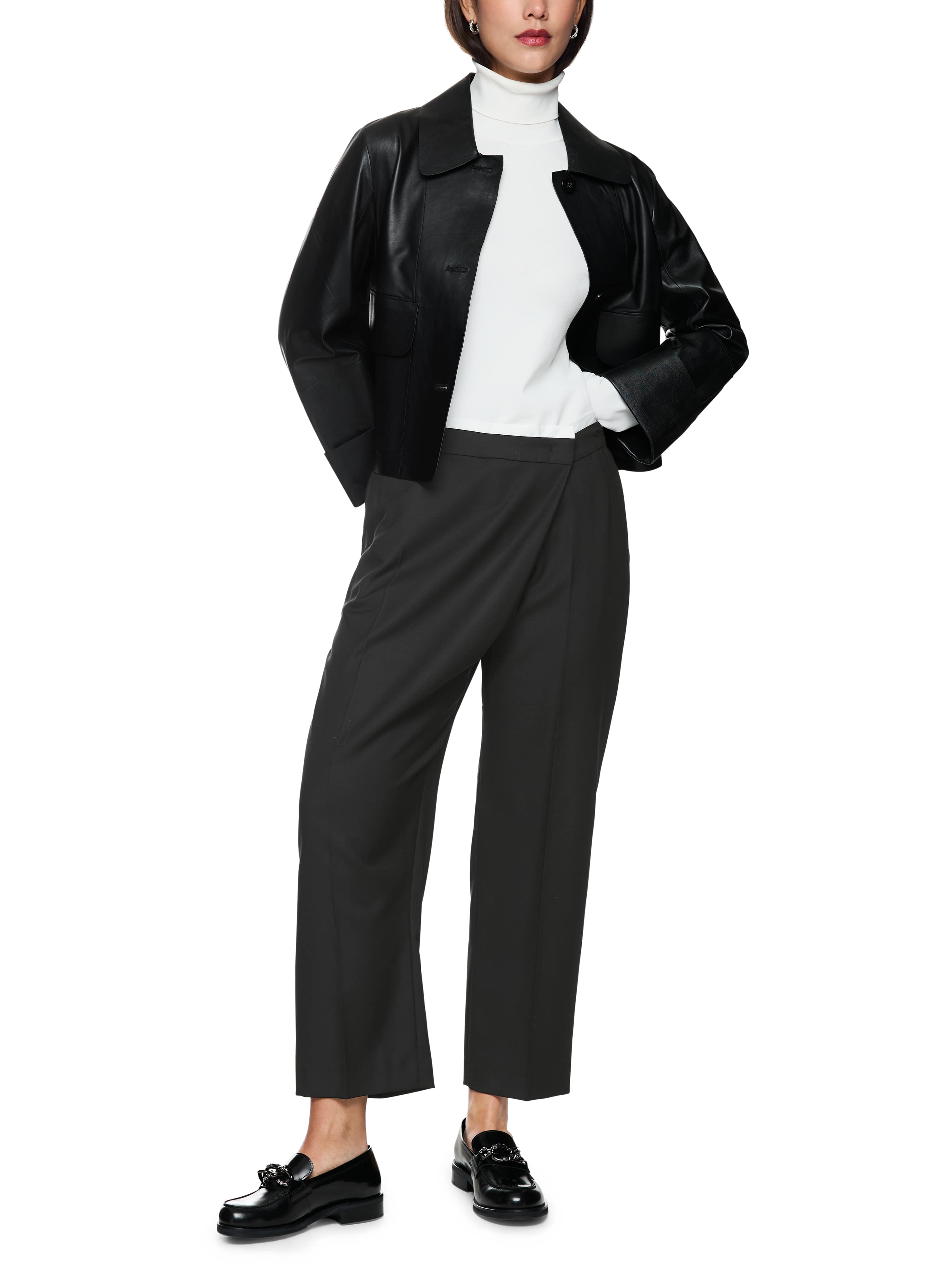 מכנסיים בגזרה נינוחה מראה קז'ואל באורך קרסול הרכב: 59% פוליאסטר, 24% צמר, 16% ויסקוזה, 1% אלסטןהדוגמנית בגובה 1.79 ולובשת מידה 3 של מארק קיין