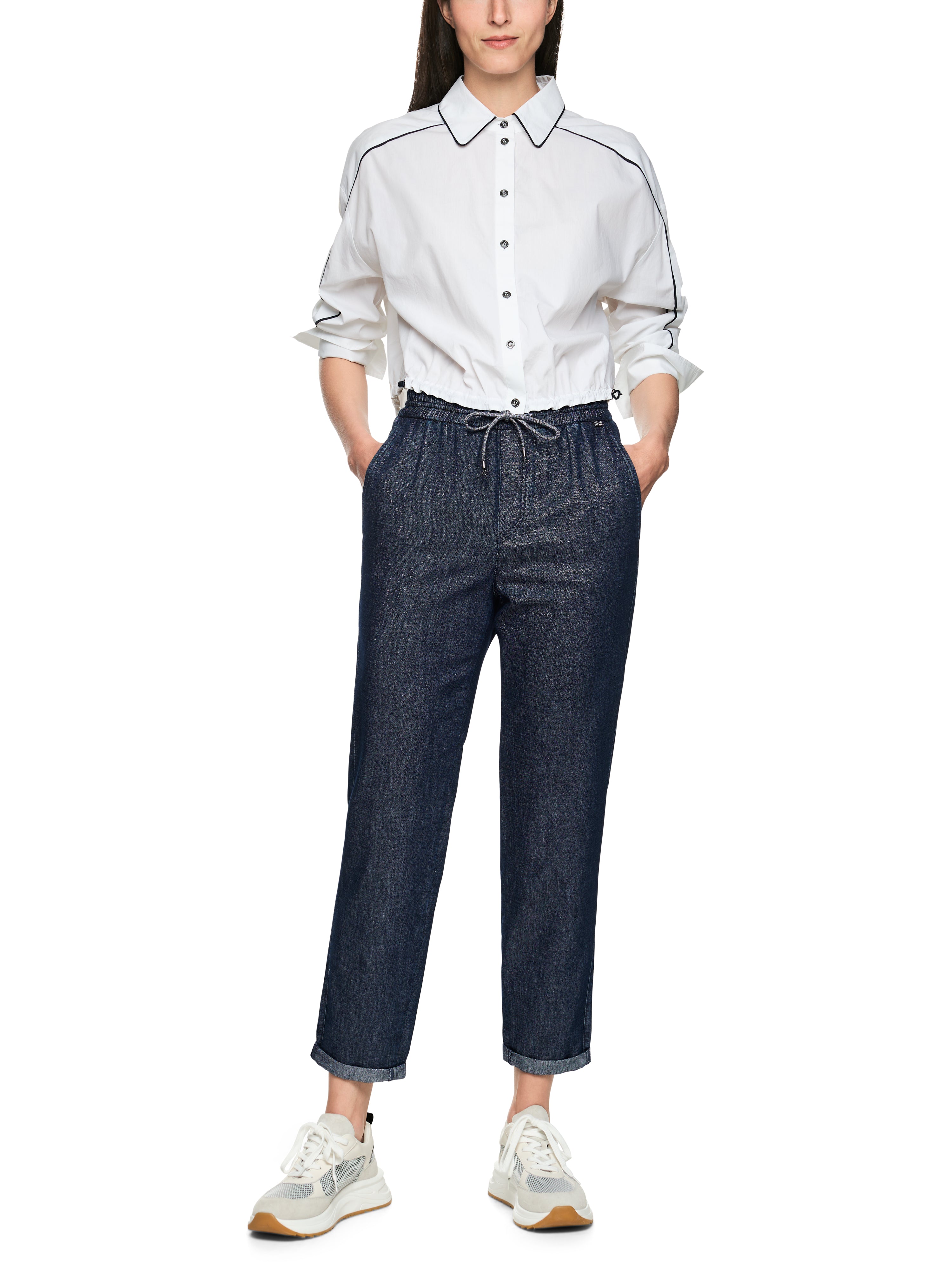 מכנסי ג'ינס בגזרה משוחררת באורך 7/8 עם קפליםהרכב: 62% כותנה, 32% ויסקוזה, 4% פוליאסטר, 2% פוליאמידהדוגמנית בגובה 1.79 ולובשת מידה 3 של מארק קיין