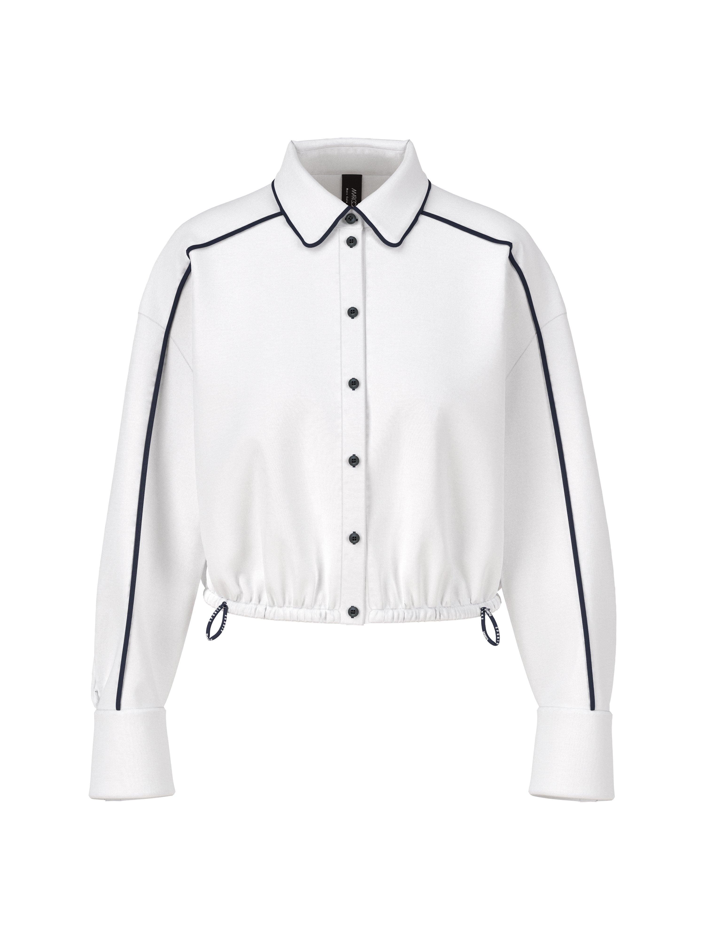 חולצה קצרה עשויה כותנה עם גומייה מתכווננת במכפלת אלסטיתהרכב: 100% כותנההדוגמנית בגובה 1.79 ולובשת מידה 3 של מארק קיין