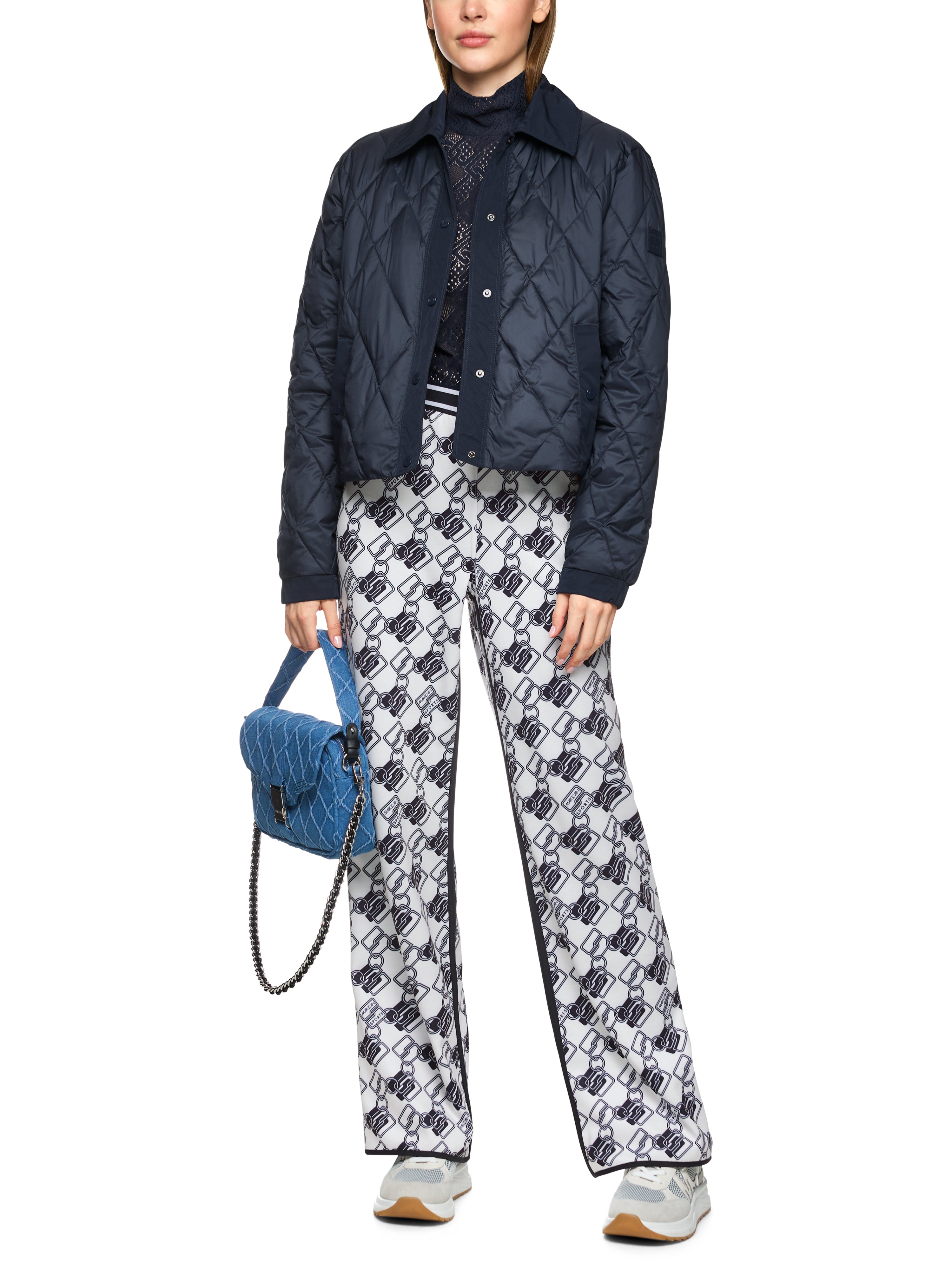 מכנסי בד סקובה בגזרה רחבה עם הדפסהרכב: 79% פוליאסטר, 17% ויסקוזה, 4% אלסטןהדוגמנית בגובה 1.79 ולובשת מידה 3 של מארק קיין