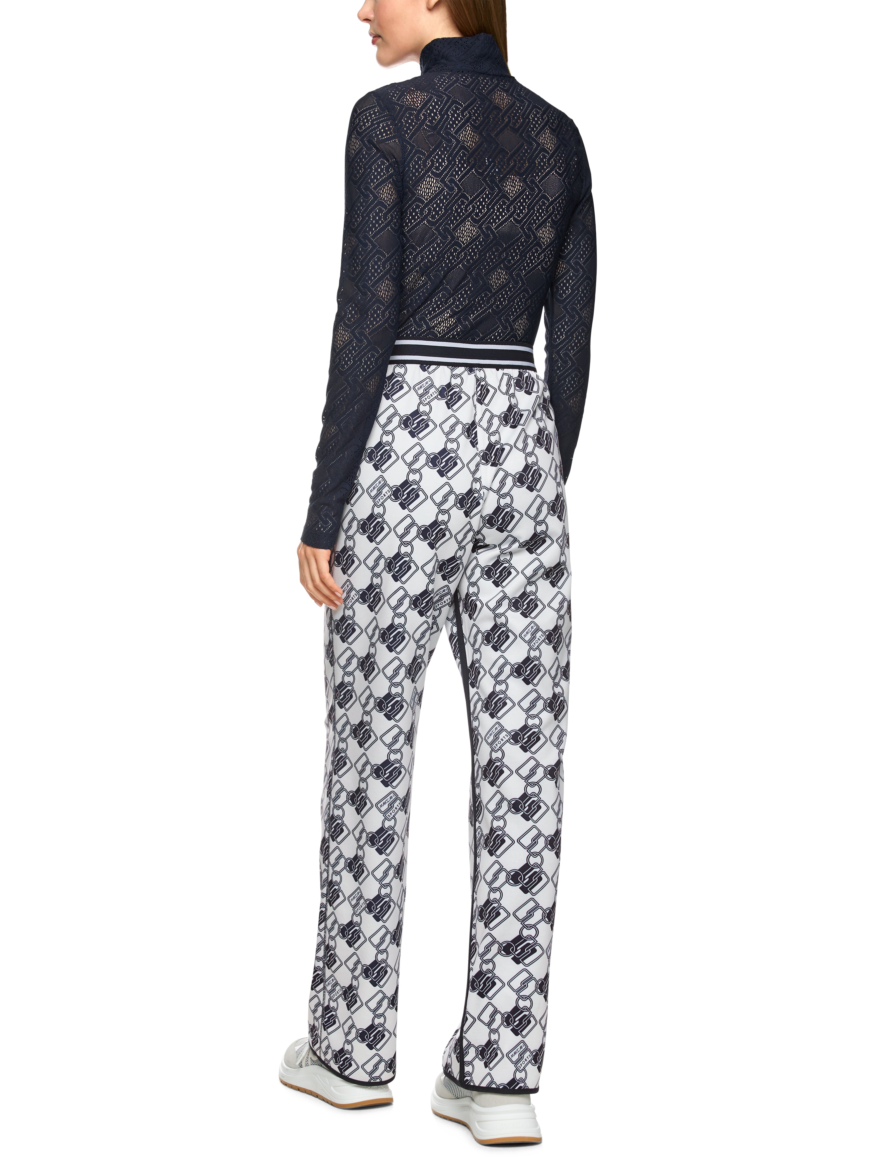 מכנסי בד סקובה בגזרה רחבה עם הדפסהרכב: 79% פוליאסטר, 17% ויסקוזה, 4% אלסטןהדוגמנית בגובה 1.79 ולובשת מידה 3 של מארק קיין