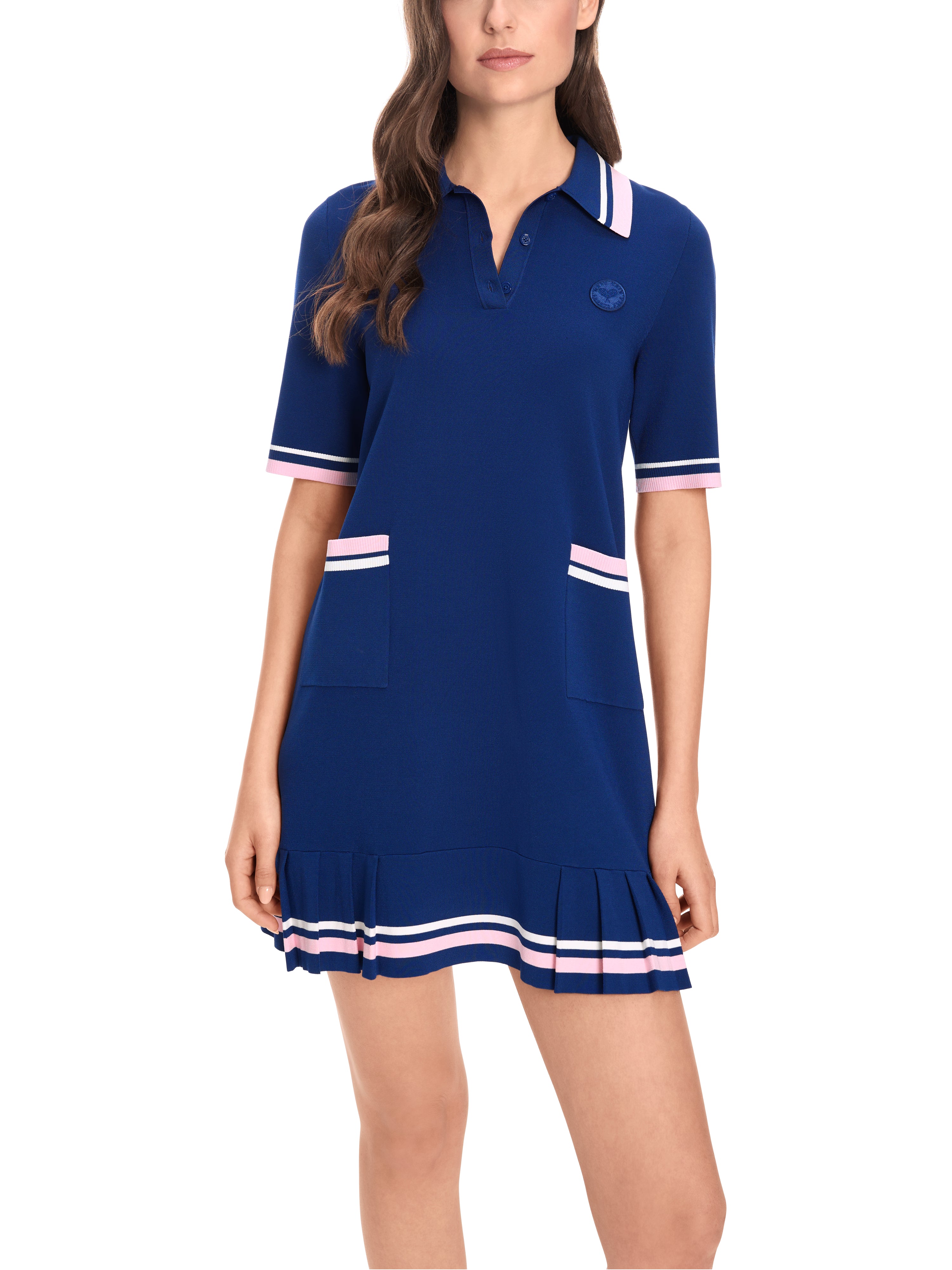 שמלת סריג באורך מיני בגזרת A עם קפלים בסיומתהרכב: 78% ויסקוזה, 22% פוליאסטרהדוגמנית בגובה 1.79 ולובשת מידה 3 של מארק קיין