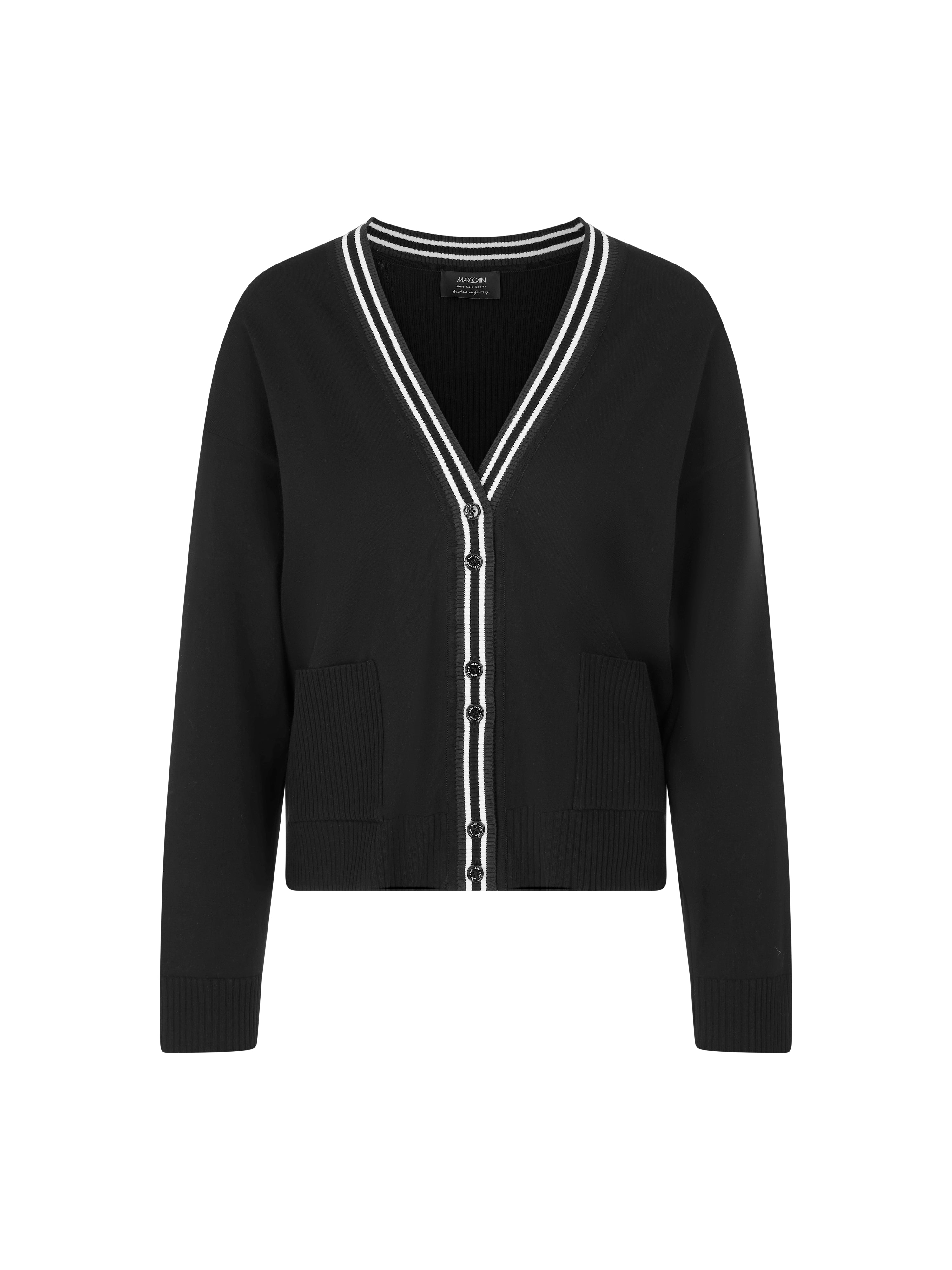 קרדיגן קלאסי בגזרה רחבה עם צווארון V עמוק וסגירת כפתוריםהרכב: 70% ויסקוזה, 30% פוליאסטרהדוגמנית בגובה 1.79 ולובשת מידה 3 של מארק קיין