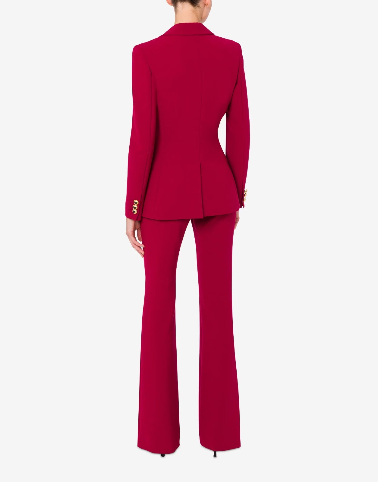 בלייזר מחוייט מקולקציית MOSCHINO Couture עם סגירת כפתור בצורת לבהרכב: 88% פוליאסטר, 12% אלסטןדוגמנית בגובה 1.78 ולובשת מידה 42 איטלקית