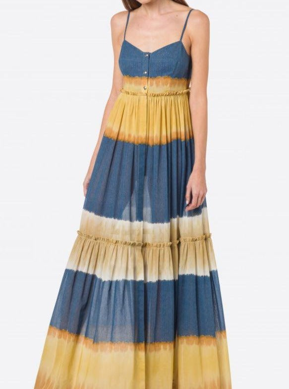 שמלת מקסי עם הדפס טאי דאי בשילוב כפתורים לאורך החזיתהרכב: 100% כותנההדוגמנית בגובה 1.78 ולובשת מידה 40 איטלקית