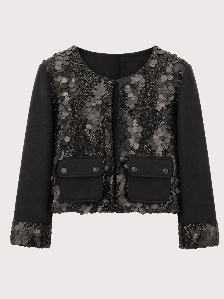 ז'קט סטייטמנט מבית האפנה TRICOT CHIC עם פייטים בגדלים שונים בחלקו הקדמי ושרוולי 3/4 עם פייטים בקצה.ז'קט קלאסי עם טוויסט שמשדרג כל לוק. הרכב: 52% ויסקוזה 20% פוליאסטר 18% ניילון 3% פוליאמיד 1% ספנדקס הדוגמנית 1.78 ולובשת מידה 42 איטלקי