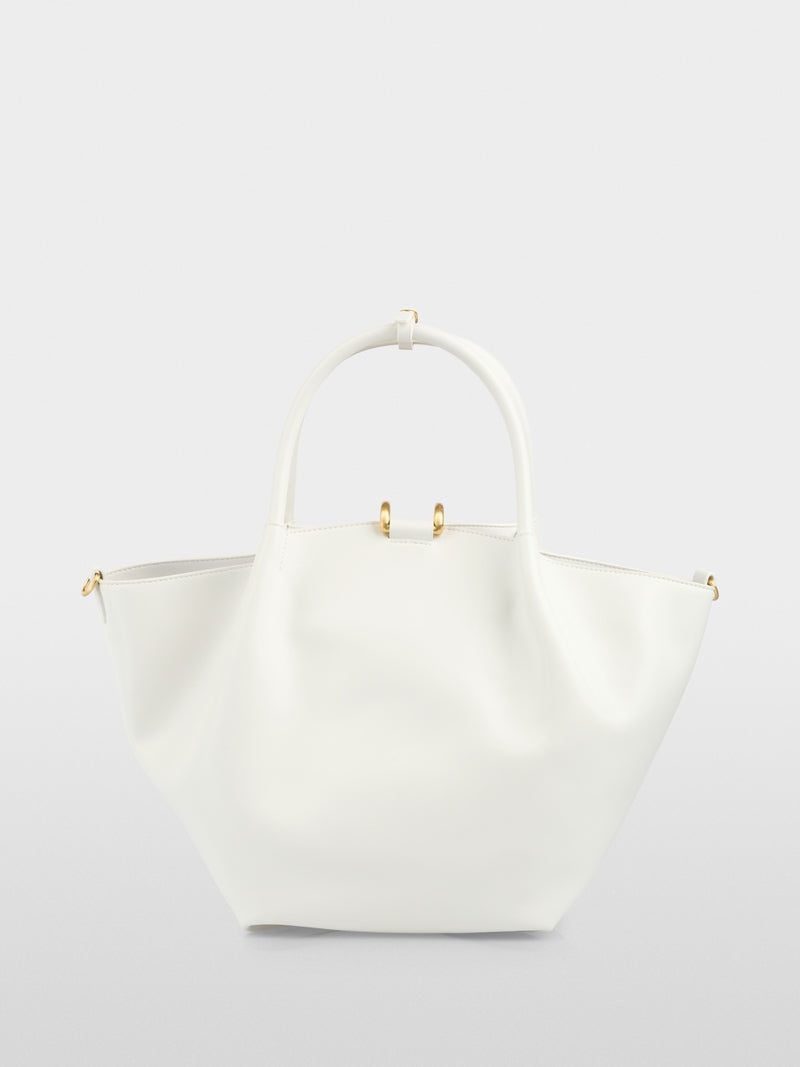 תיק נשיאה אלגנטי, עם ידיות אחיזה מעוגלות, ורצועת כתף נשלפת ומתכווננת למגוון אפשרויות נשיאה.תא פנימי עם רוכסן, וסגירה מגנטית עם וו מעוצב.מידות: 43*17*25 ס"מהרכב: 65% עור ממוחזר, 19% פוליאוריטן, 16% פוליאסטר