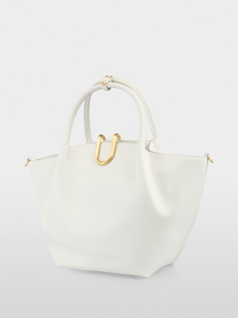 תיק נשיאה אלגנטי, עם ידיות אחיזה מעוגלות, ורצועת כתף נשלפת ומתכווננת למגוון אפשרויות נשיאה.תא פנימי עם רוכסן, וסגירה מגנטית עם וו מעוצב.מידות: 43*17*25 ס"מהרכב: 65% עור ממוחזר, 19% פוליאוריטן, 16% פוליאסטר