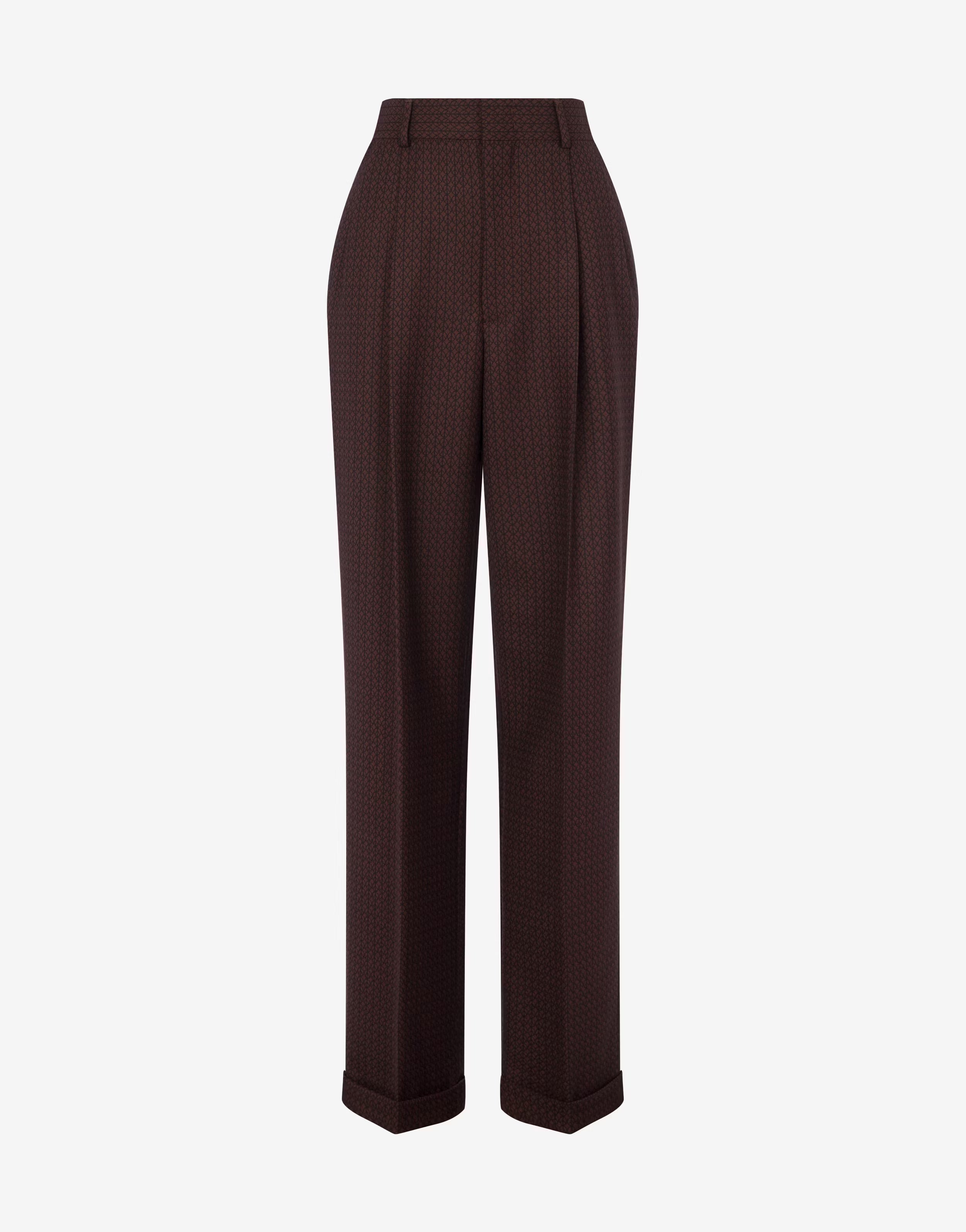 מכנסיים מחוייטים בגזרה גבוהה מקולקציית MOSCHINO Couture עם קפלים במותןהרכב: 100% צמר; בטנה: 60% אצטט, 40% ויסקוזהדוגמנית בגובה 1.80 ולובשת מידה 42 איטלקית