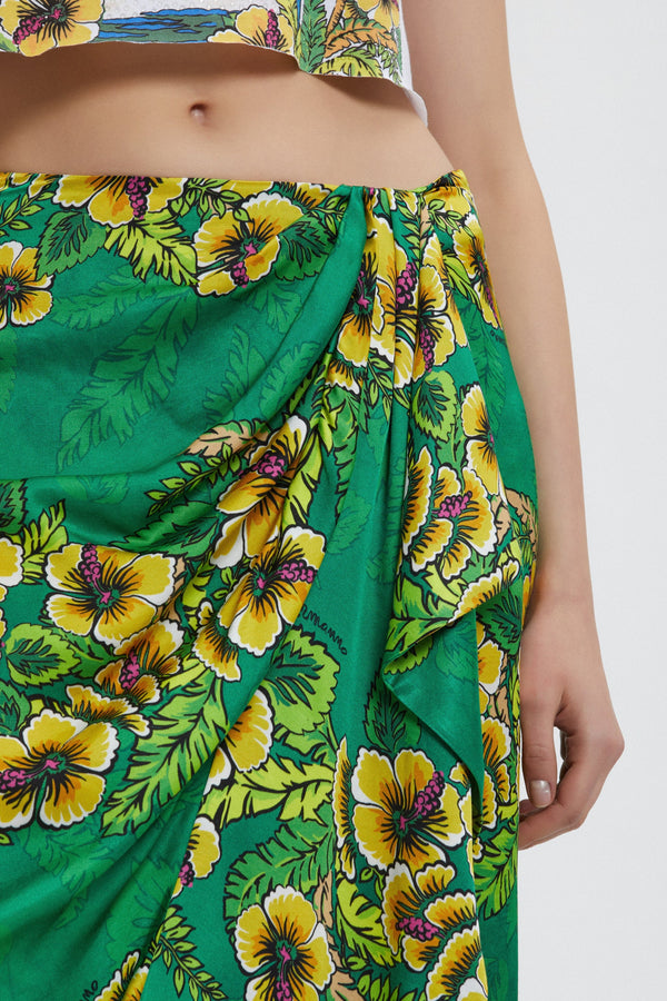 חצאית מידי סטייל פריאו בהדפס פרחים צהובים על רקע ירוק