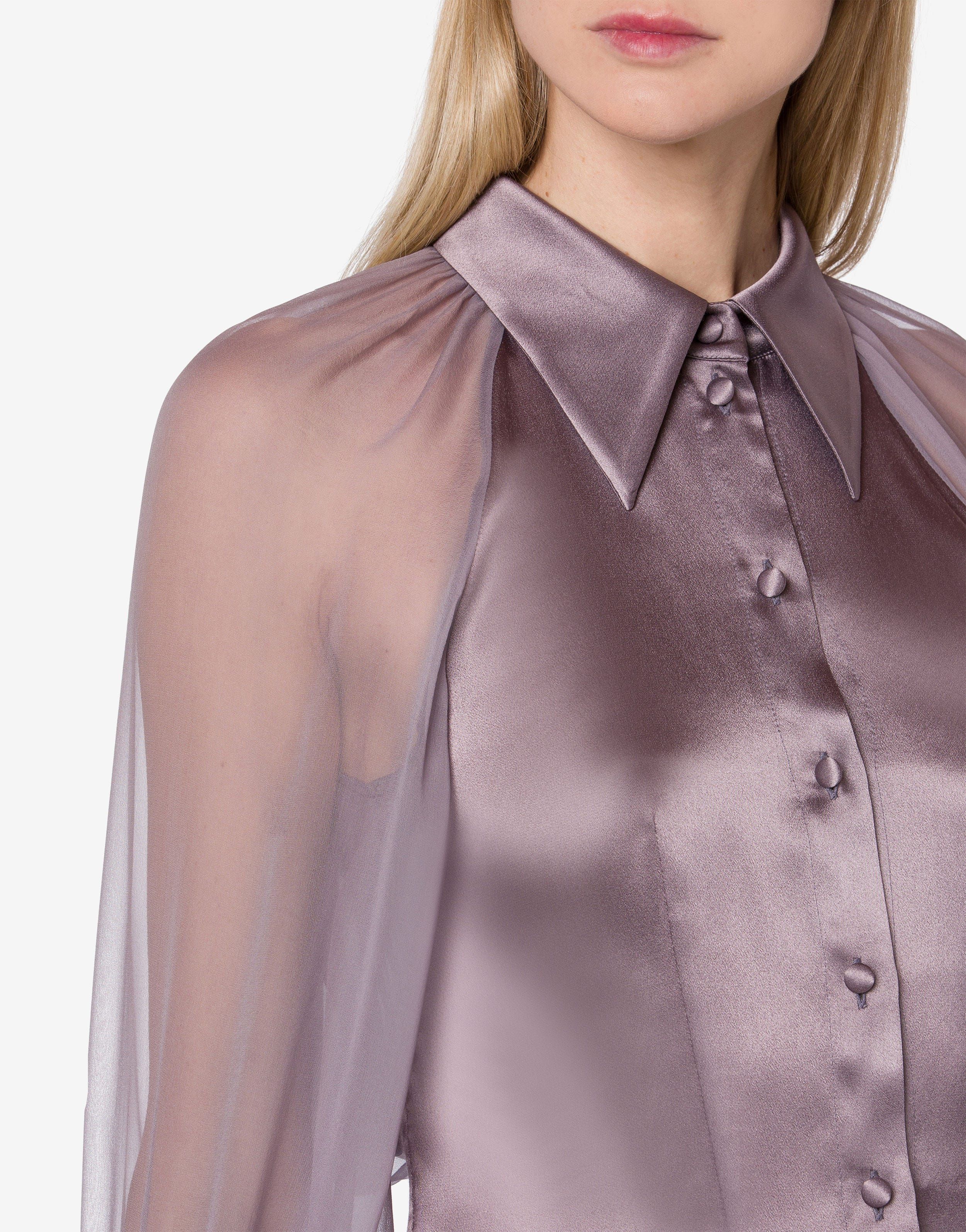 חולצת משי אלגנטית בצבע לילך עם שרוולים וגב שקופיםהרכב: 100% משיהדוגמנית בגובה 1.78 ולובשת מידה 42 איטלקית