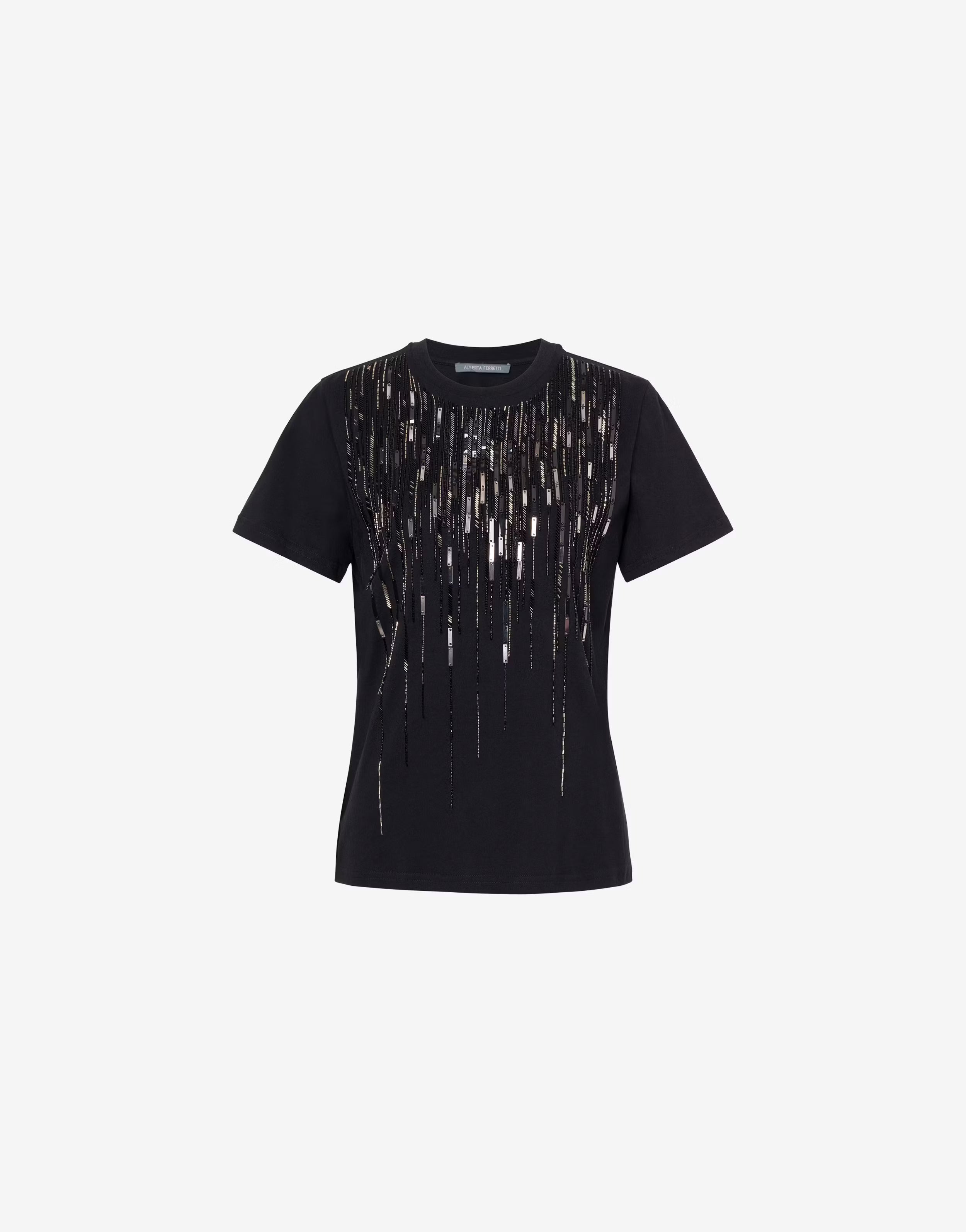 חולצת טי שרט מכותנה בעיטור פייטים וחרוזיםהרכב: 100% כותנההדוגמנית בגובה 1.81 ולובשת מידה M