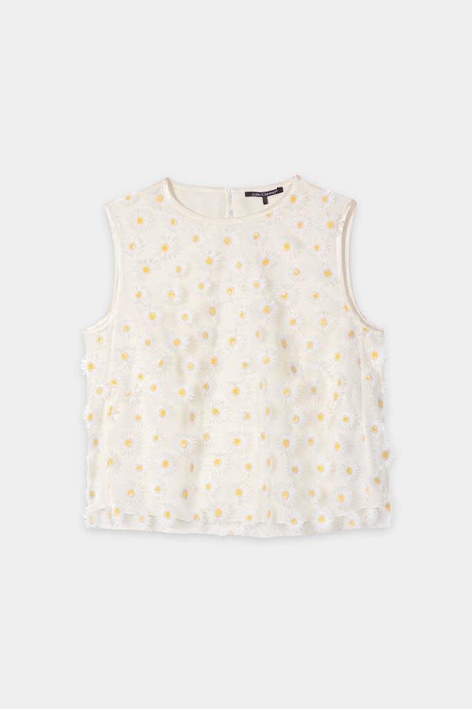 חולצה מבית המותג Luisa Cerano.טופ אלגנטי בגזרה ישרה, מבד טול בעיטור רקמת פרחים תלת מימדית. ללא שרוולים, עם בטנה פנימית, צווארון עגול, וסגירת כפתורים מאחור.הרכב: 100% פוליאסטר, בטנה- 100% ויסקוזההדוגמנית בגובה 1.78 ולובשת מידה 36 של Luisa Cerano