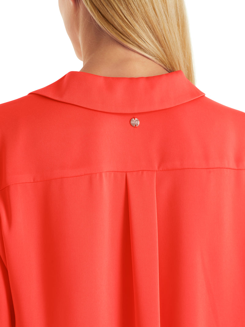 חולצה אלגנטית סטייל פולו בצבע קורל מראה נוזלי ללא כפתורים שרוול ארוך