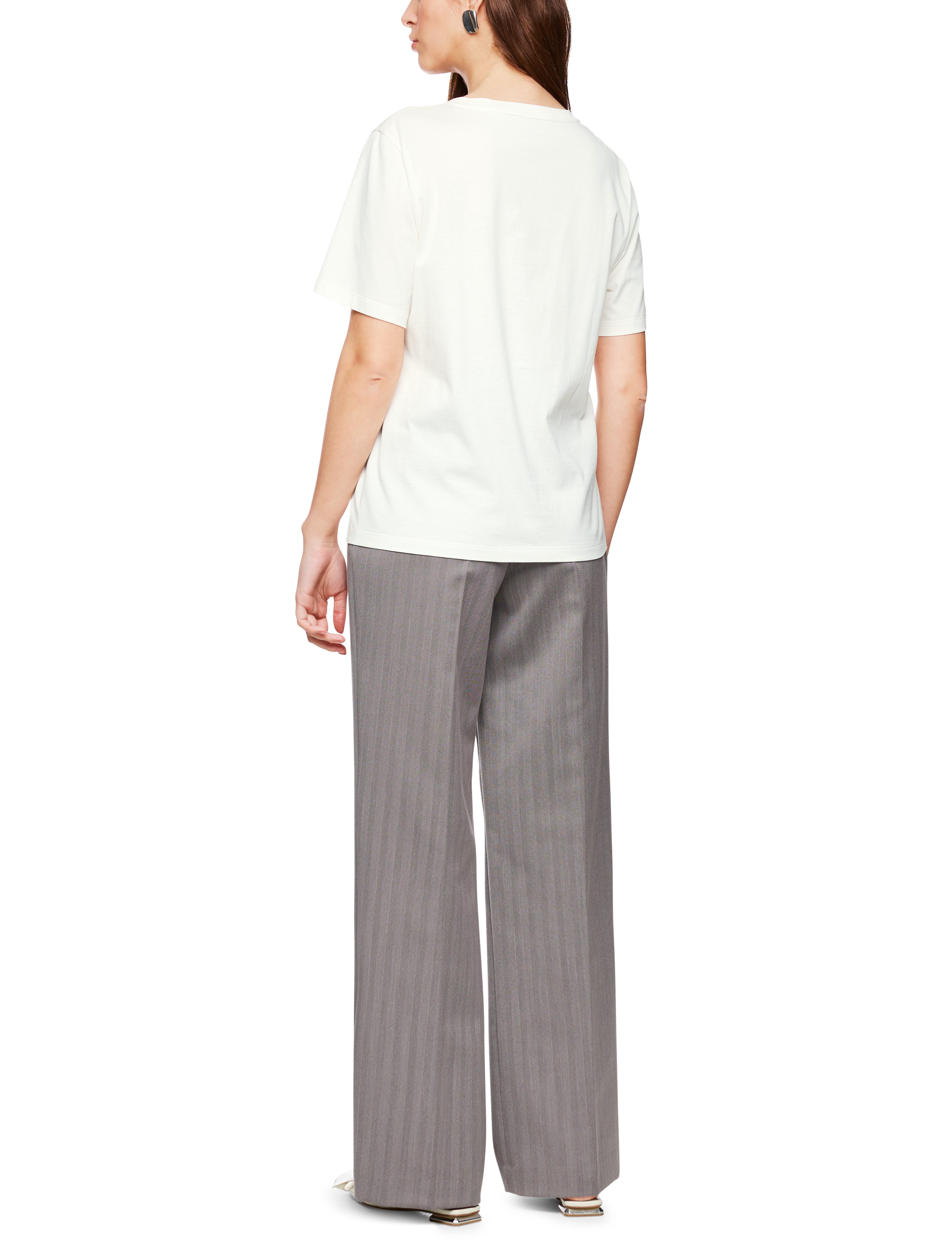 חולצת טי כותנה עם הדפסהרכב: 100% כותנההדוגמנית בגובה 1.79 ולובשת מידה 3 של מארק קיין