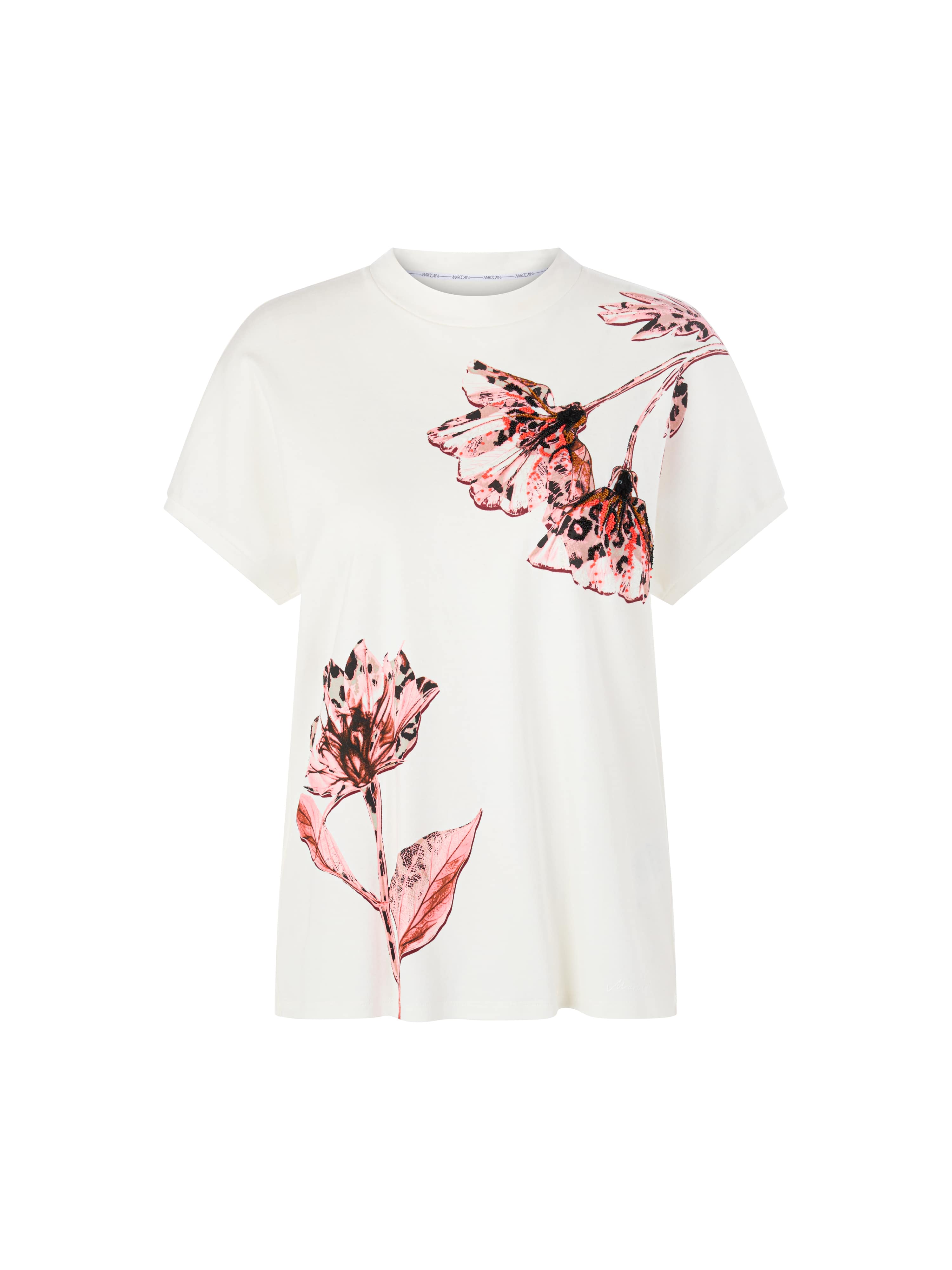 חולצת טי עשויה כותנה עם הדפסהרכב: 100% כותנההדוגמנית בגובה 1.79 ולובשת מידה 3 של מארק קיין