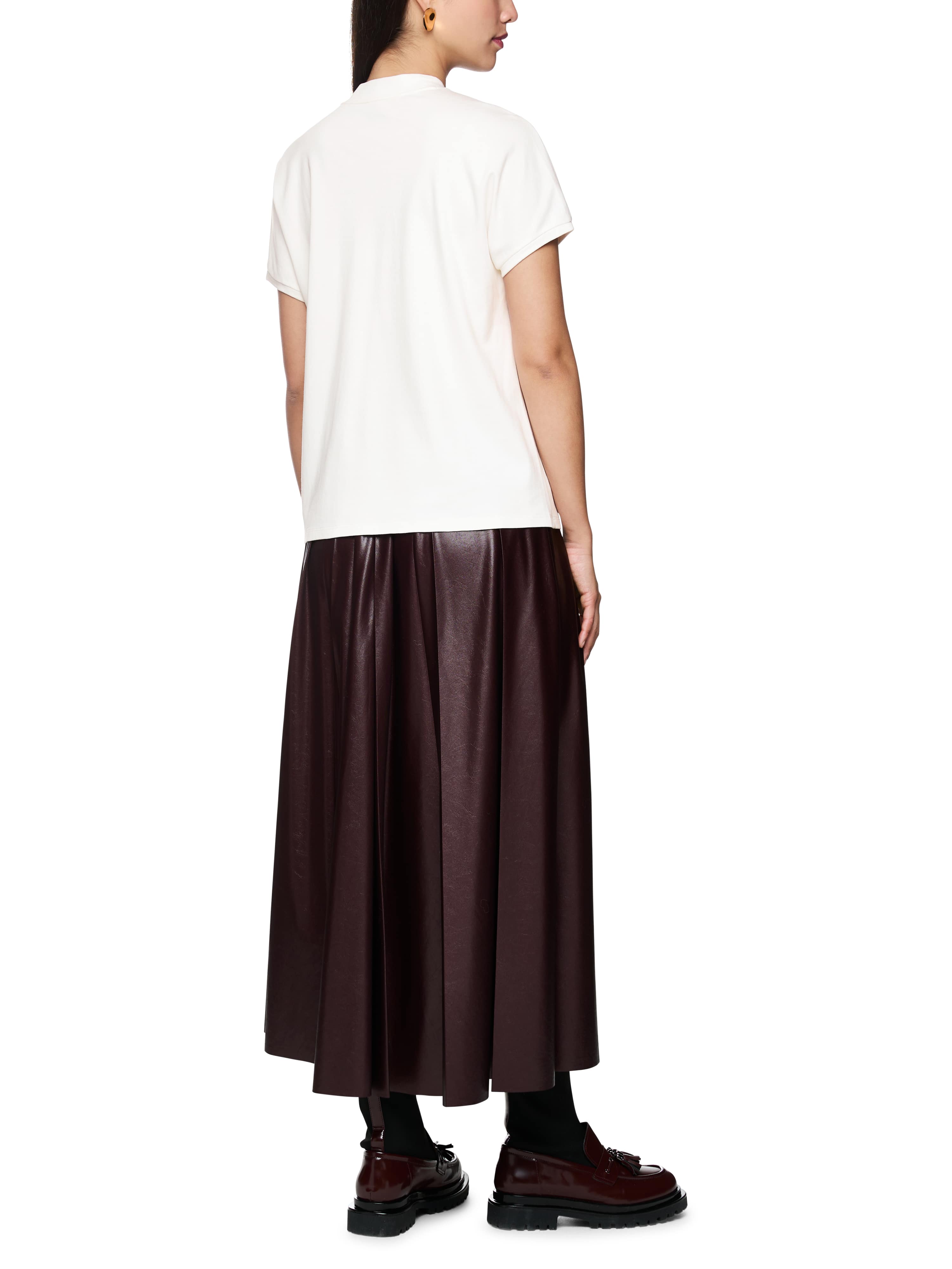 חולצת טי עשויה כותנה עם הדפסהרכב: 100% כותנההדוגמנית בגובה 1.79 ולובשת מידה 3 של מארק קיין