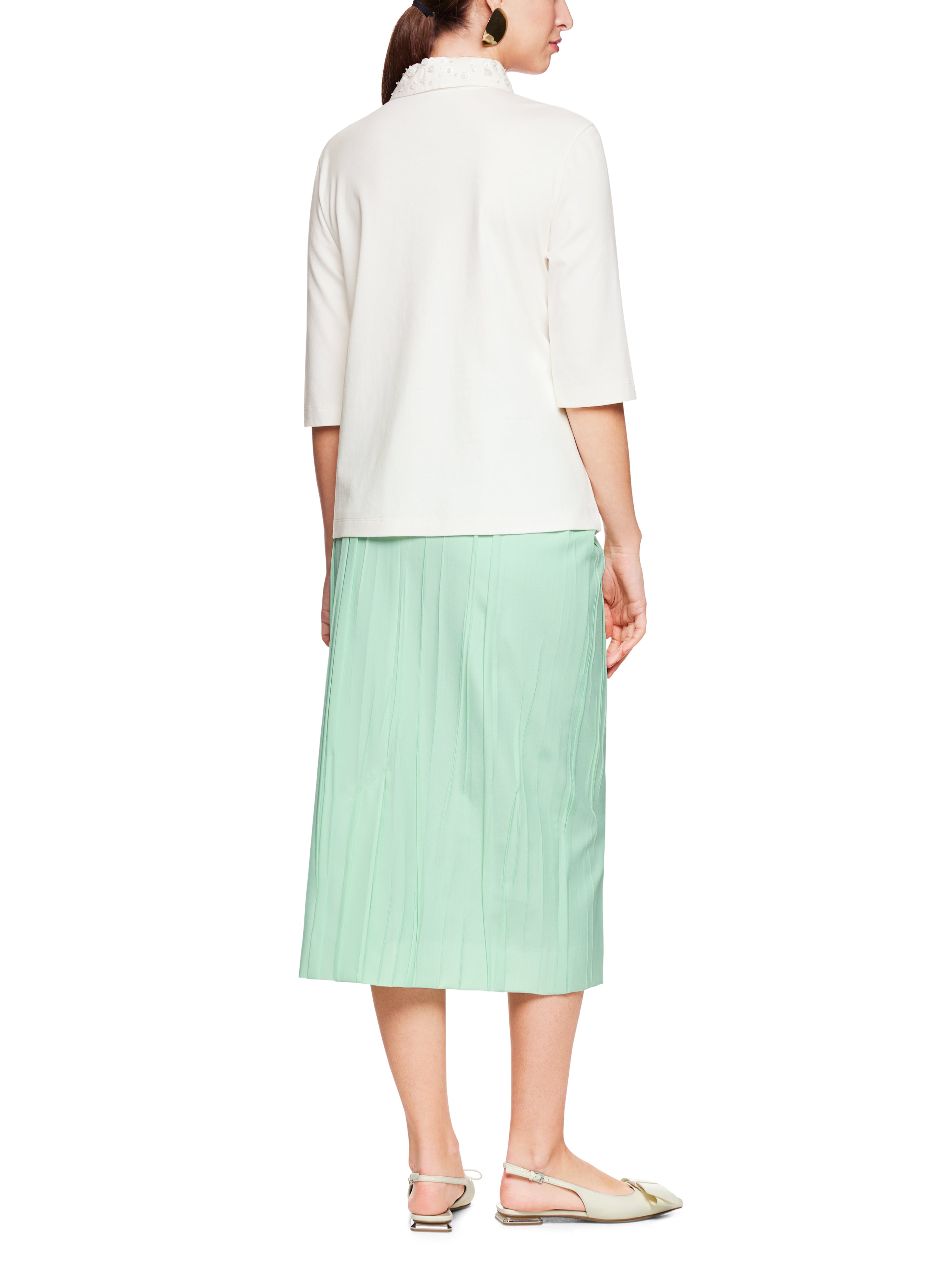 חולצת פולו בעיטור פנינים בצווארון עם שרוולים באורך 3/4הרכב: 100% כותנההדוגמנית בגובה 1.79 ולובשת מידה 3 של מארק קיין