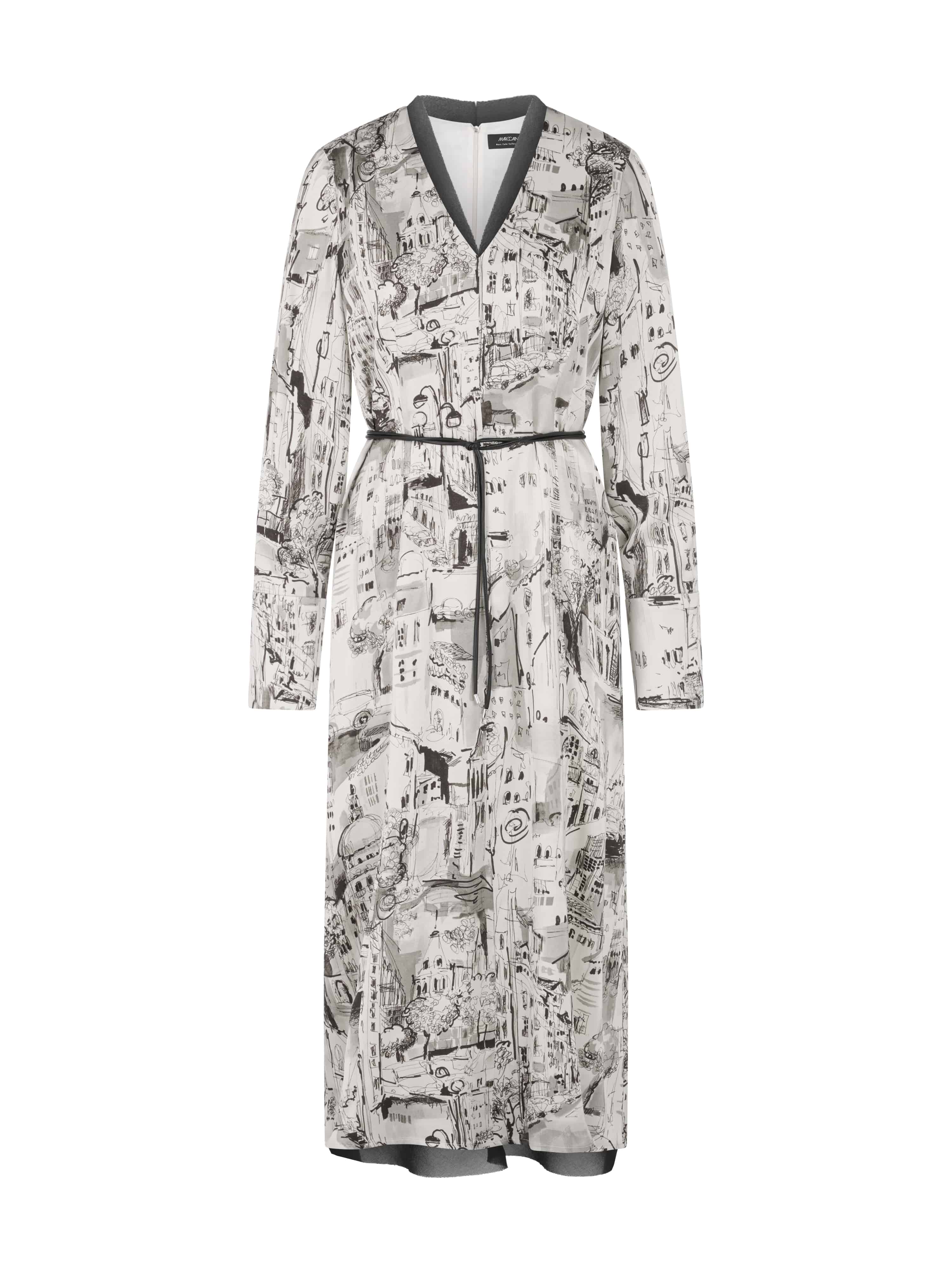 שמלה קלילה עם הדפס אורבני, גימורי רשת שקופים במחשוף ובשוליים, בשילוב חגורת קשירה להדגשת המותןהרכב: 100% פוליאסטרהדוגמנית בגובה 1.79 ולובשת מידה 3 של מארק קיין