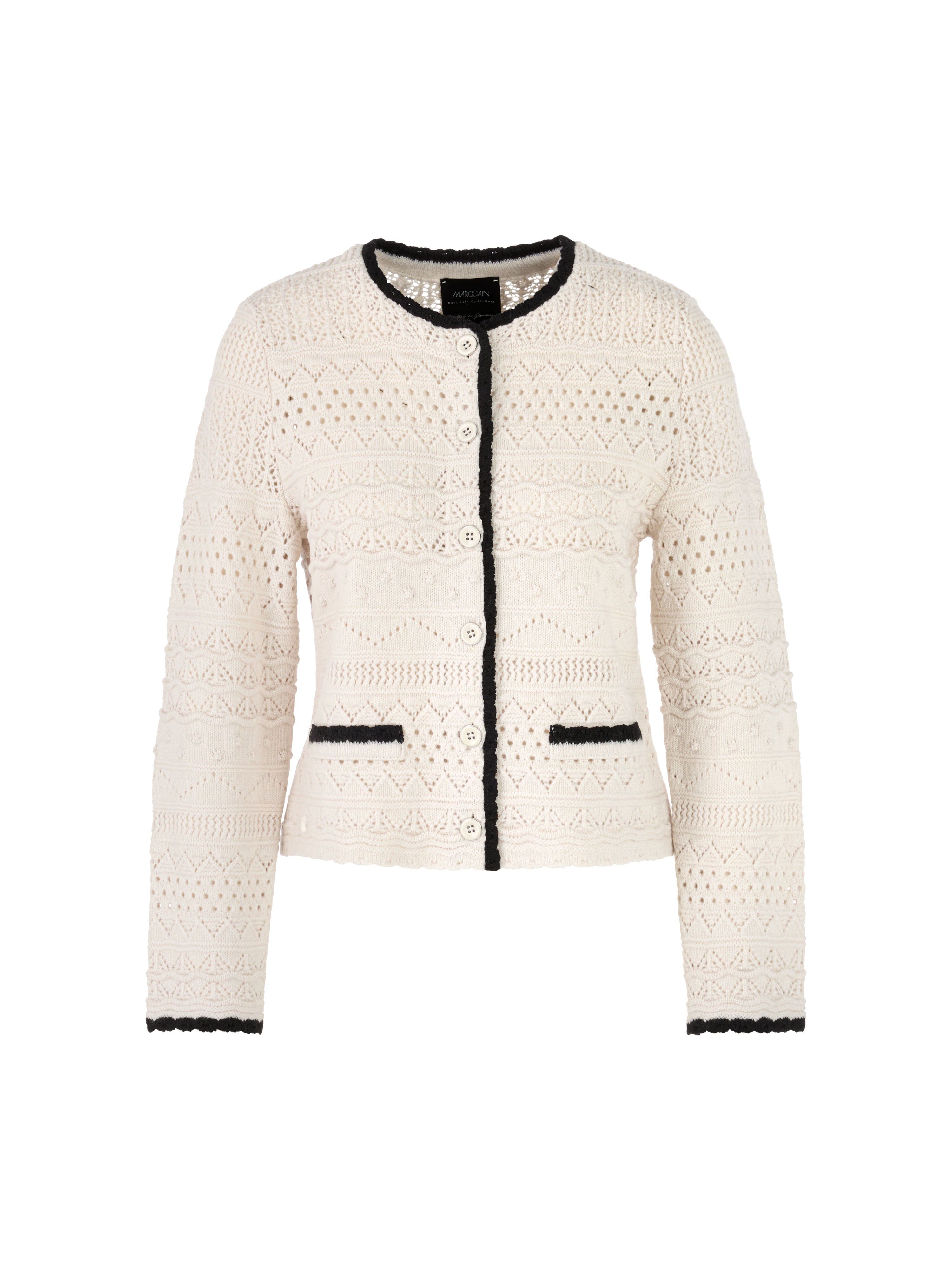 קרדיגן דק בגוון בז' עם פתחים עדינים ועיטורים כהים לאורך הצווארון, הכפתורים והשרווליםהגזרה ישרה, עם מפתח צוואר עגולהרכב בד: 100% צמרהדוגמנית בגובה 1.79 ולובשת מידה 3 של מארק קיין