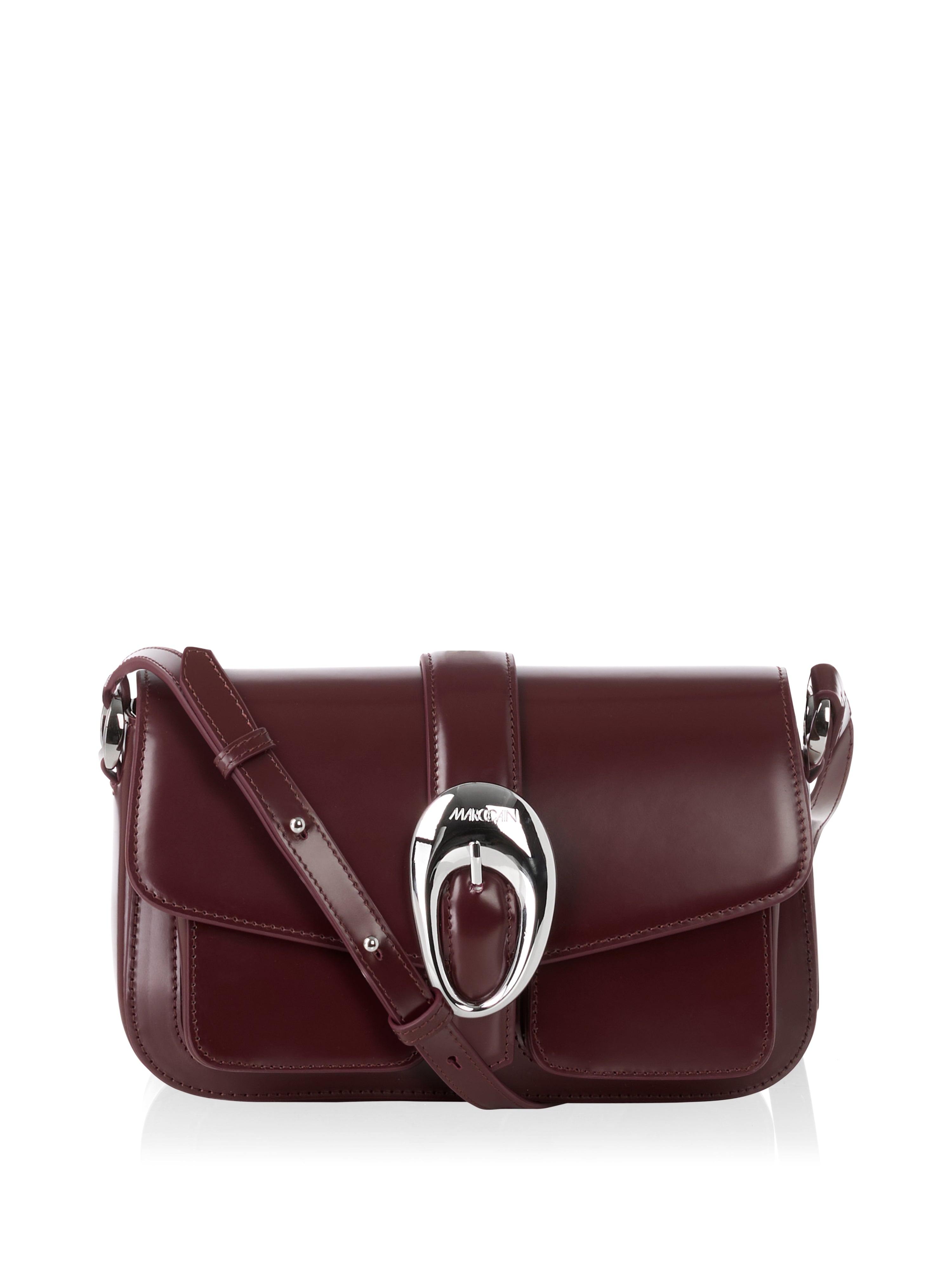 תיק כתף עשוי עור עם אבזם דקורטיבי ורצועה מתכווננת הרכב: 100% עורמידות: 10*15*24 ס"מ