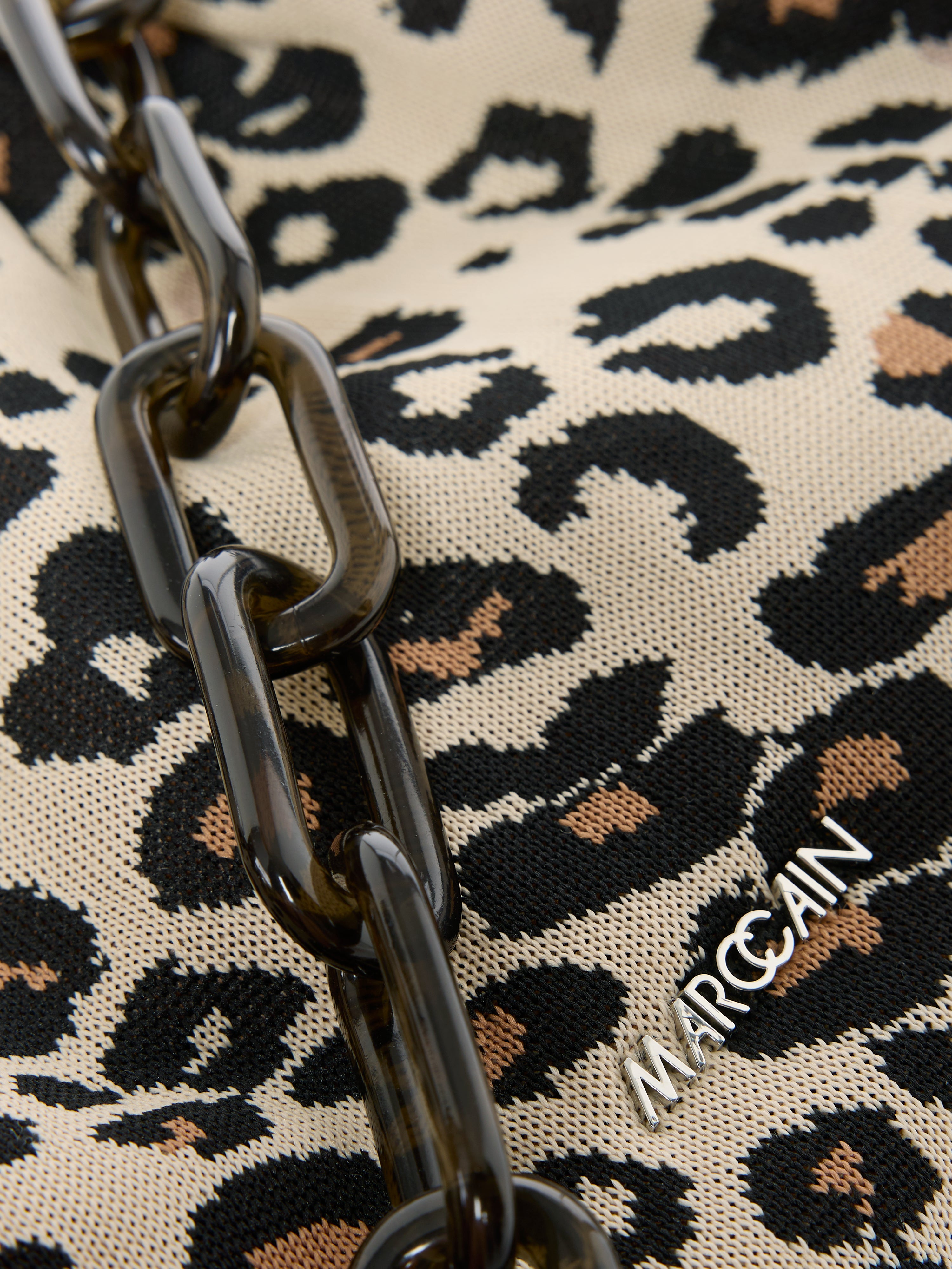 תיק קלאץ' סרוג עם הדפסהרכב: 100% פוליסאטרמידות: 17*11*31 ס"מ