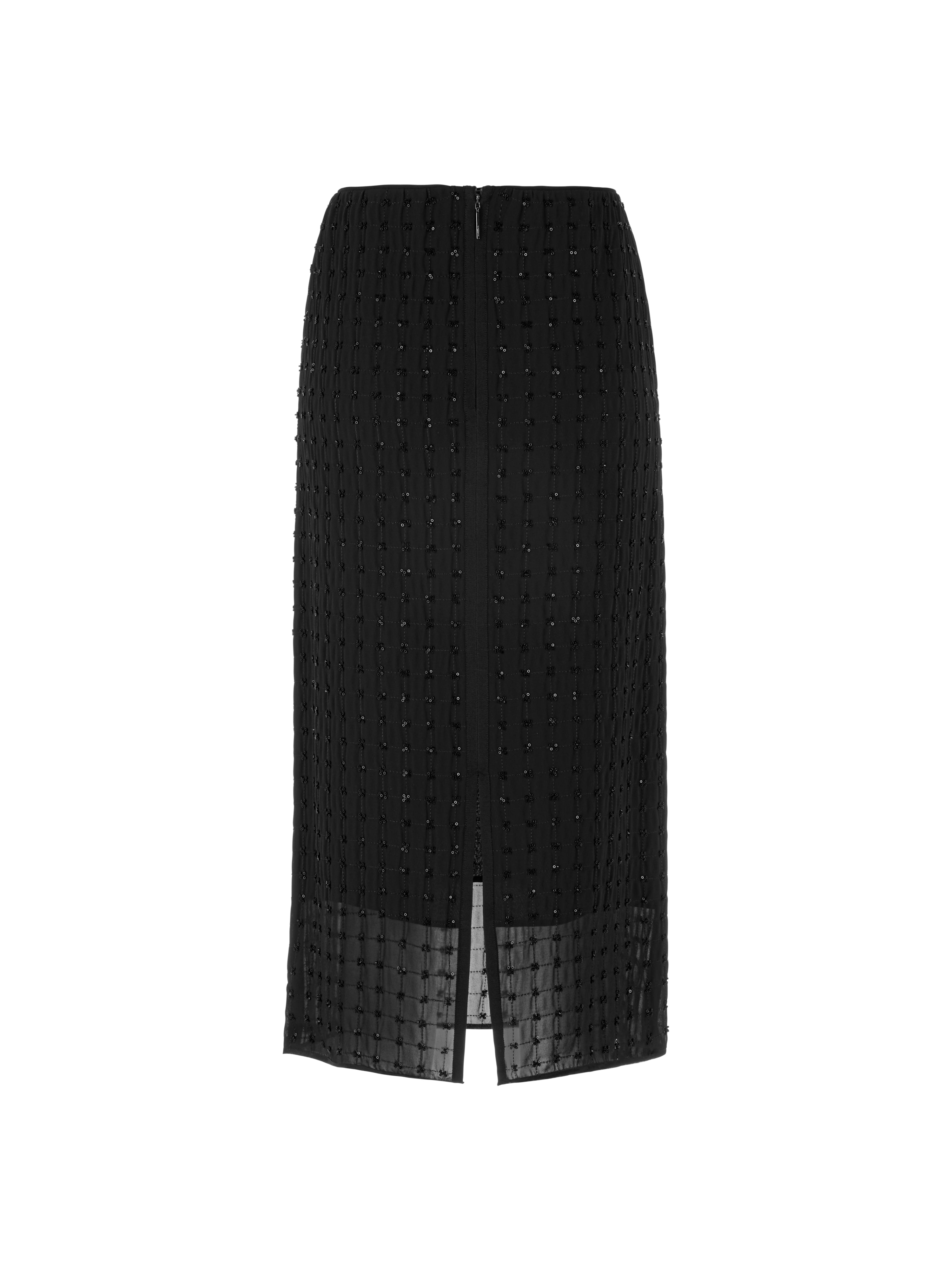 חצאית שחורה ישרה באורך מידי, רקומה כולה בפאייטים מבריקיםכוללת רוכסן נסתר ושסע אחוריהרכב בד: 100% פוליאסטרהדוגמנית בגובה 1.79 ולובשת מידה 3 של מארק קיין