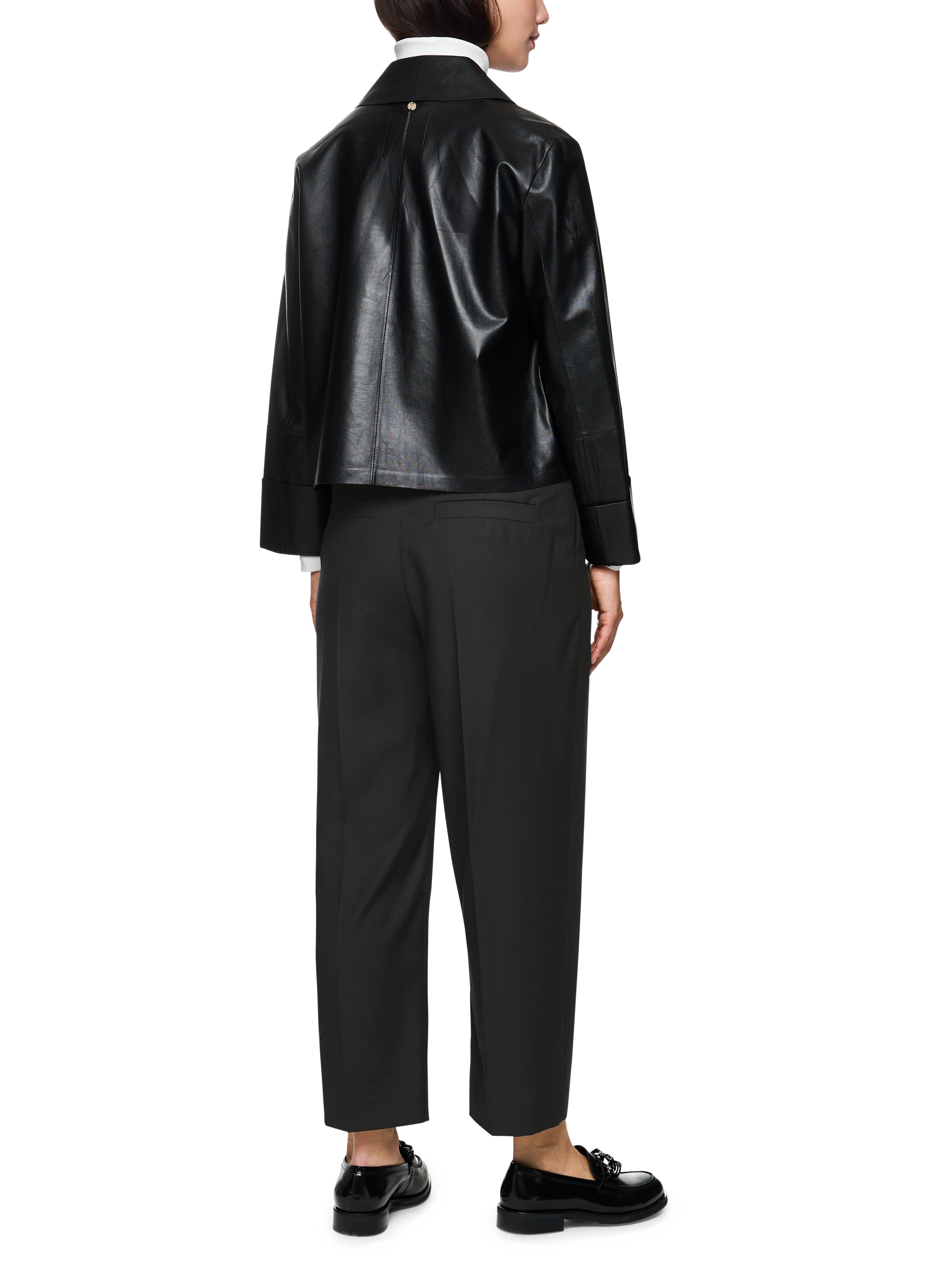 מכנסיים בגזרה נינוחה מראה קז'ואל באורך קרסול הרכב: 59% פוליאסטר, 24% צמר, 16% ויסקוזה, 1% אלסטןהדוגמנית בגובה 1.79 ולובשת מידה 3 של מארק קיין