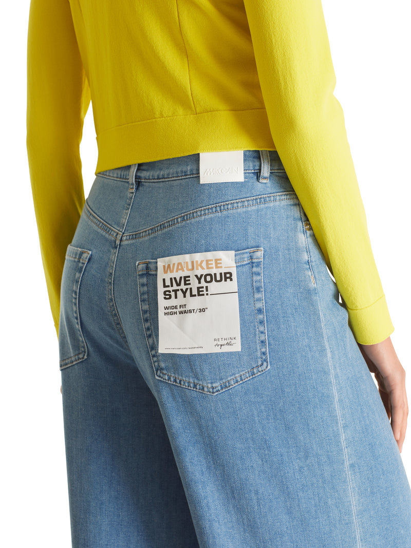 ג'ינס "RETHINK TOGETHER" דגם WAUKEE רגל מתרחבת אורך עצם עם שוליים פרחוניים