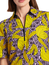 שמלה ספורטיבית גזרת A ליין אורך ברך שרוול קצר בהדפס בננות וכיתוב על רקע לילך