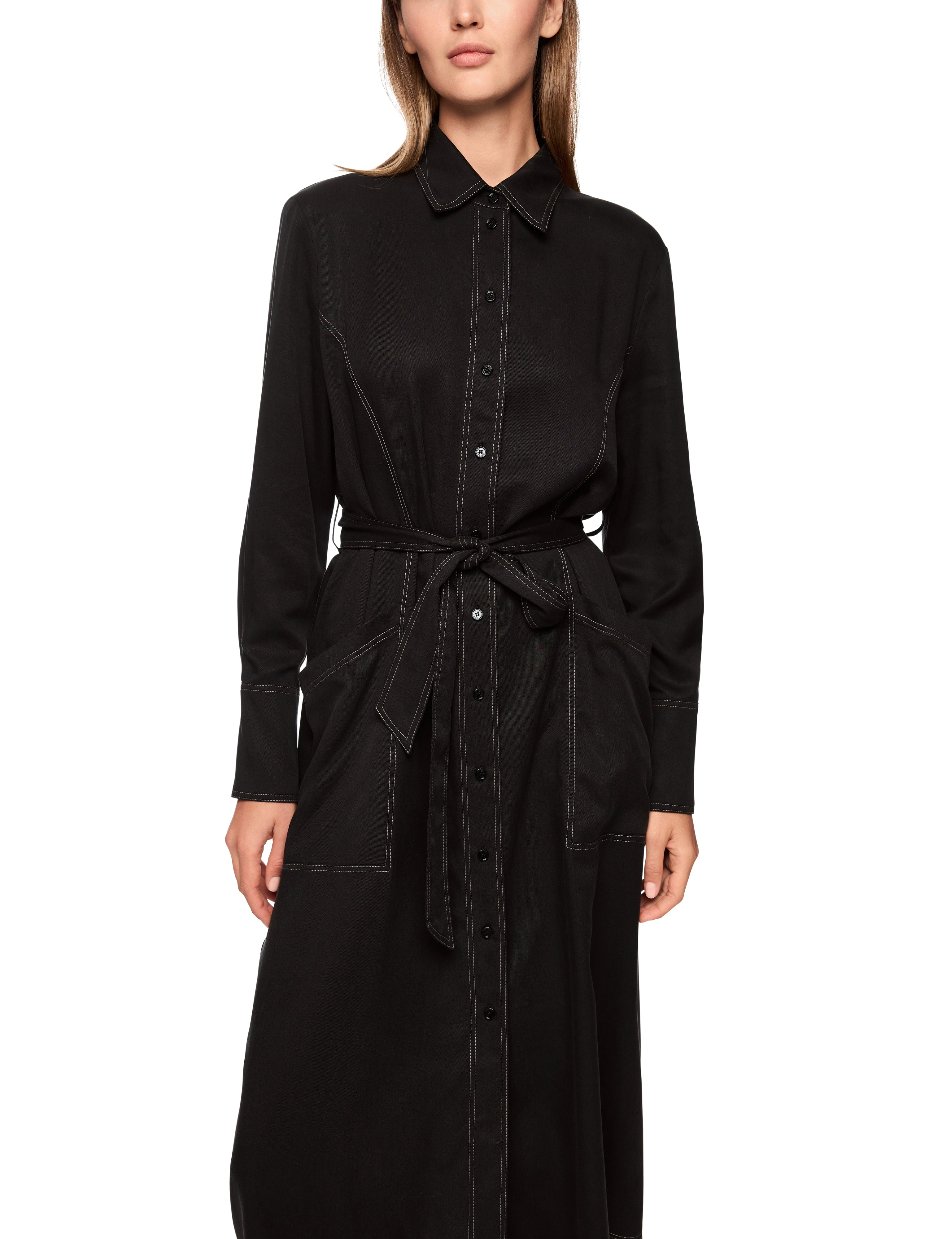 שמלת בלוזון באורך מידי בגזרה ישרה עם חגורת קשירההרכב: 100% ליוסלהדוגמנית בגובה 1.79 ולובשת מידה 3 של מארק קיין 