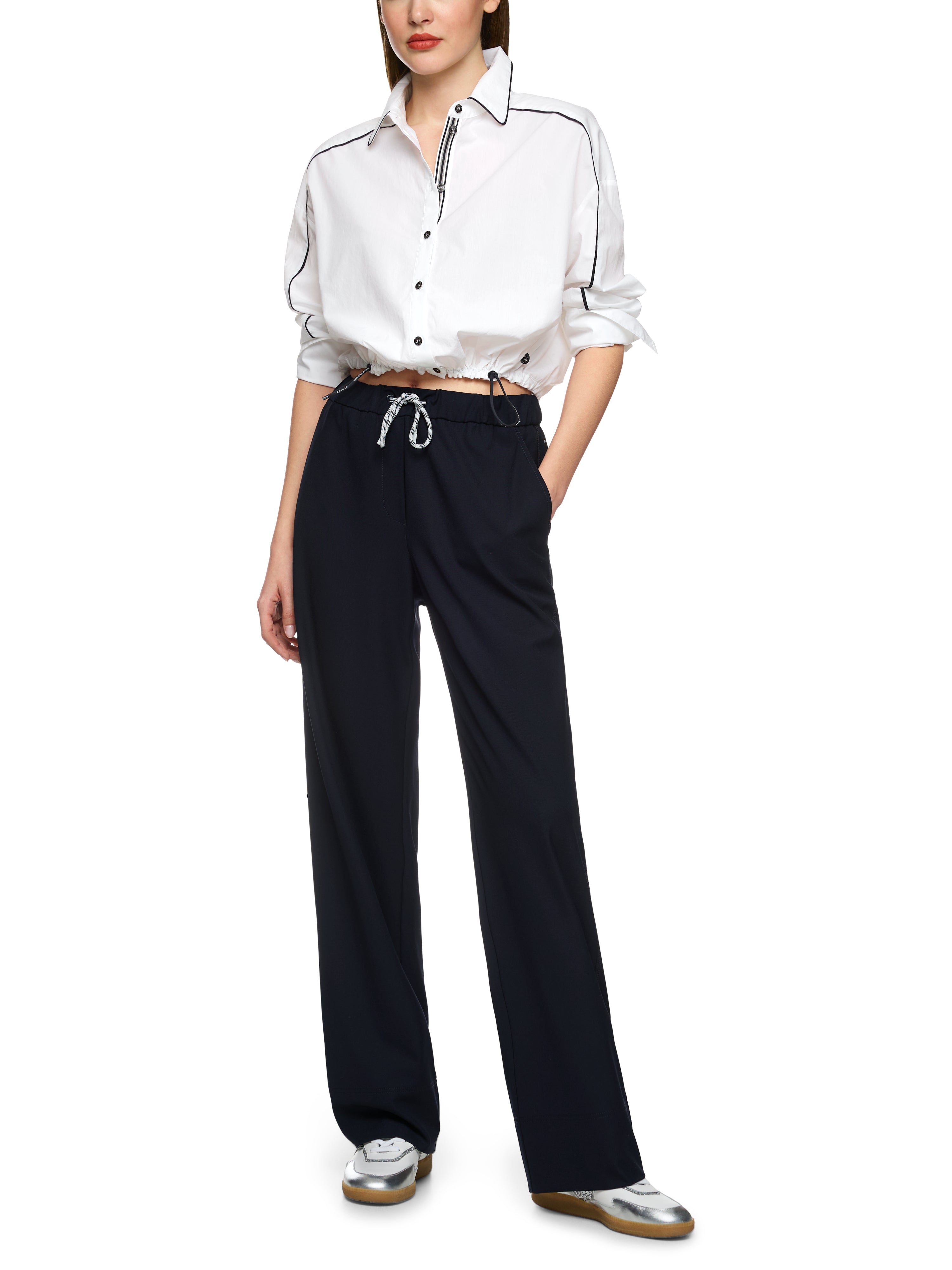 חולצה קצרה עשויה כותנה עם גומייה מתכווננת במכפלת אלסטיתהרכב: 100% כותנההדוגמנית בגובה 1.79 ולובשת מידה 3 של מארק קיין