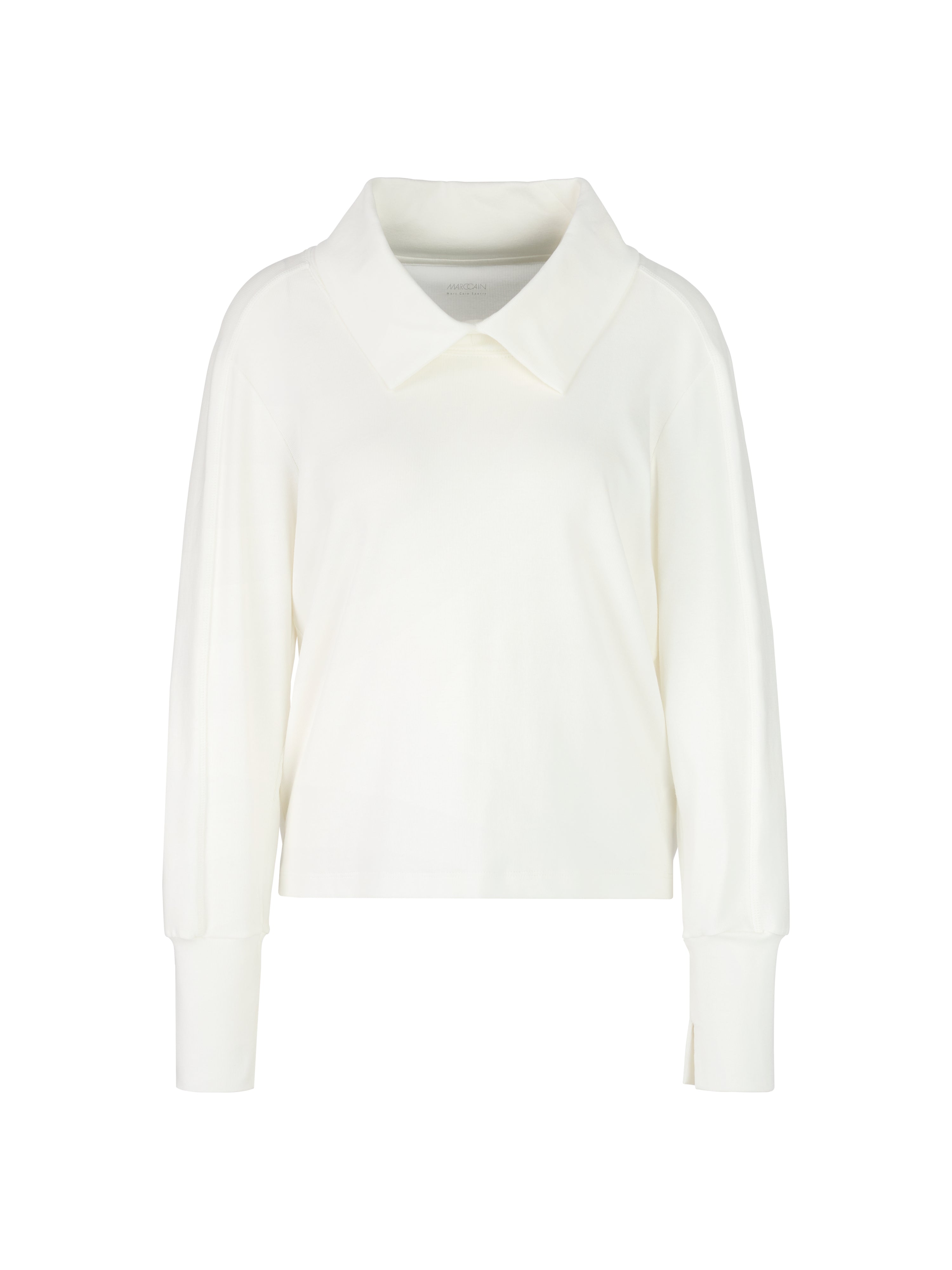 חולצת צווארון עגול בגזרה ישרה עם שרוולים ארוכיםהרכב: 94% כותנה, 6% אלסטןהדוגמנית בגובה 1.79 ולובשת מידה 3 של מארק קיין