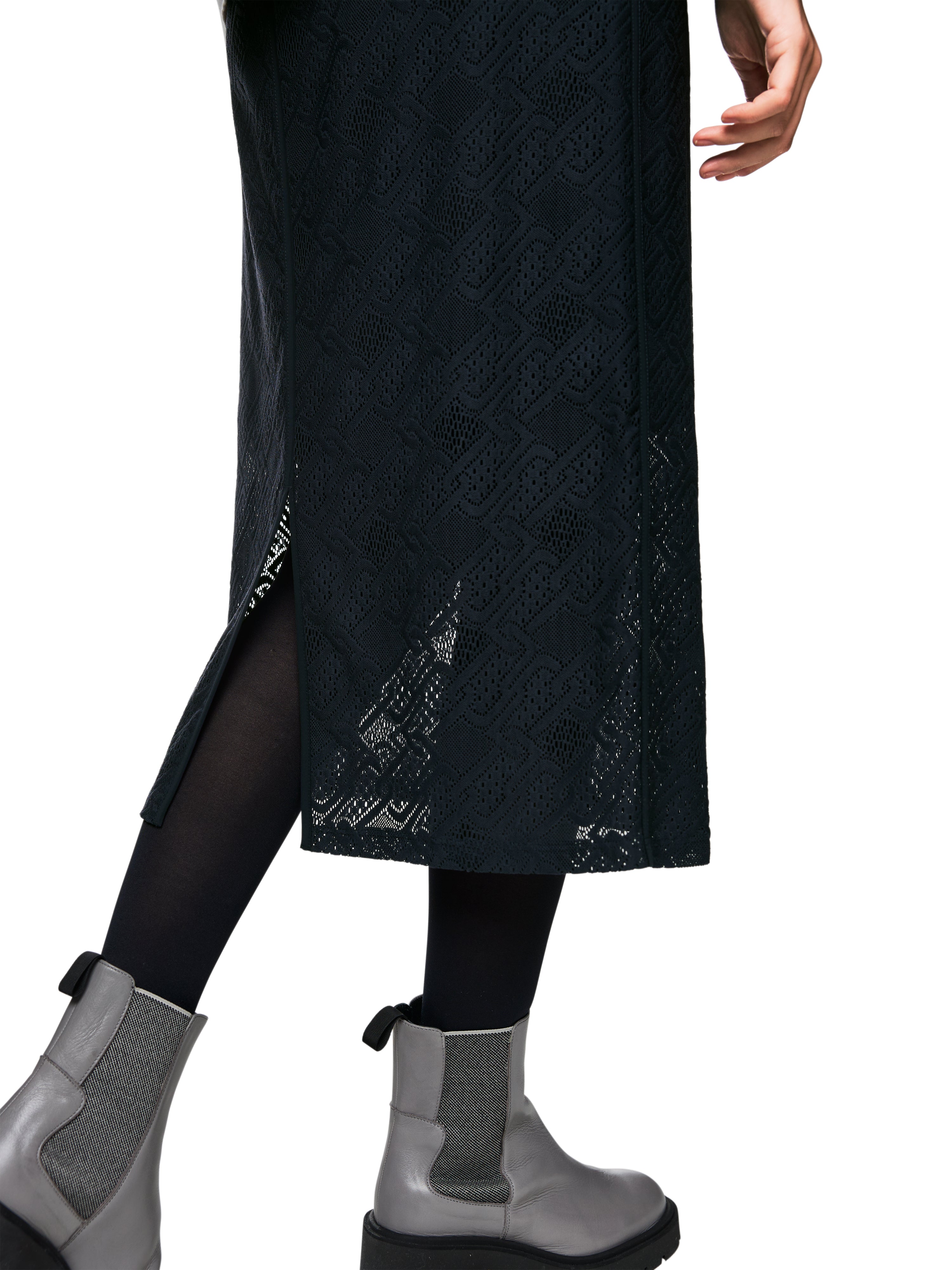 חצאית בגזרה ישרה עשויה מבד תחרה עם חגורת מותן נמתחתהרכב: 93% פוליאמיד, 7% אלסטןהדוגמנית בגובה 1.79 ולובשת מידה 3 של מארק קיין