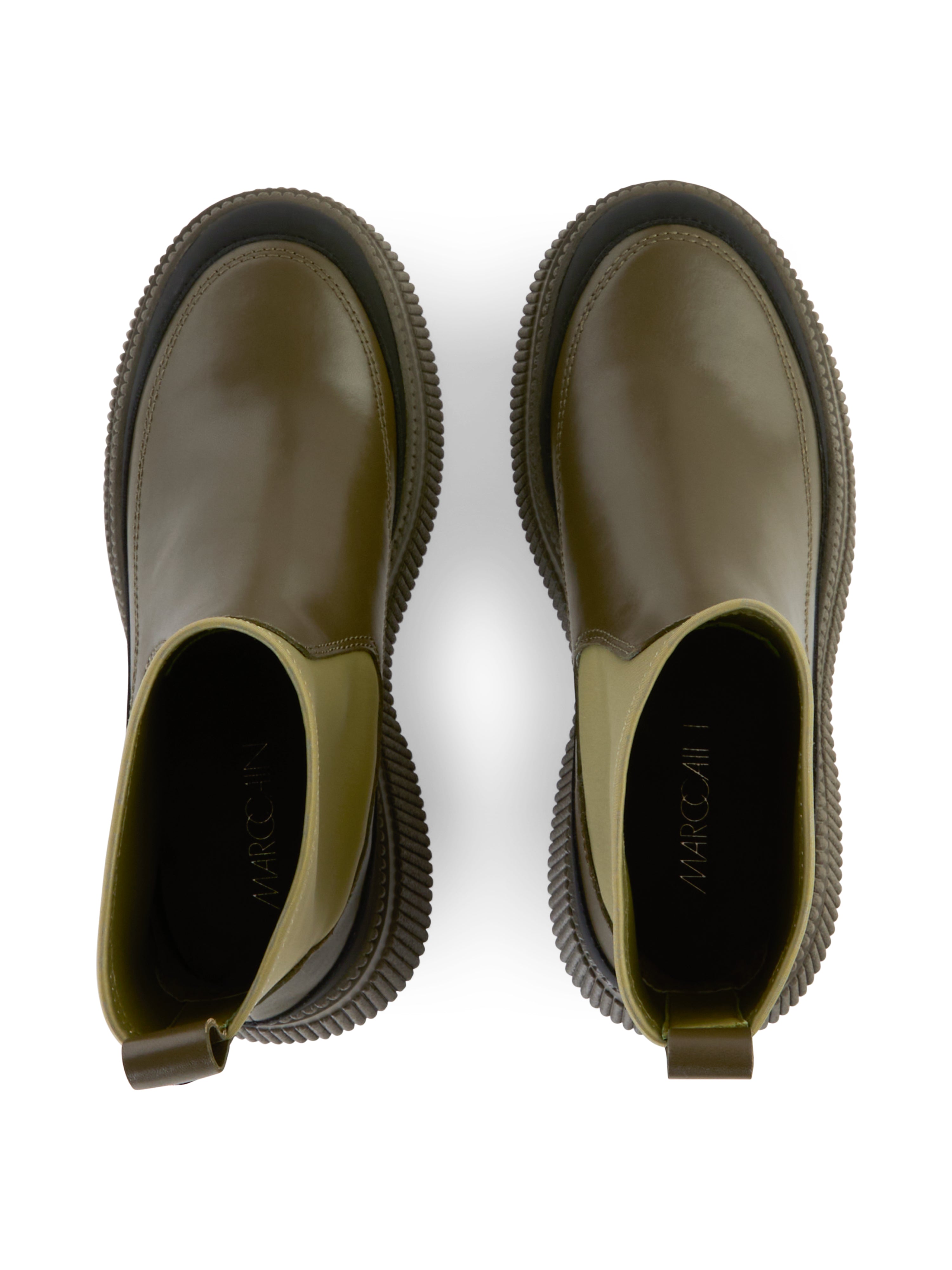 מגפי קרסול קז'ואל עם סוליית נעל מעוגלת ולולאת משיכה מאחורהרכב: ציפוי פוליאוריטן, 50% עור, 50% פוליאסטרגובה העקב: 5 ס"מ