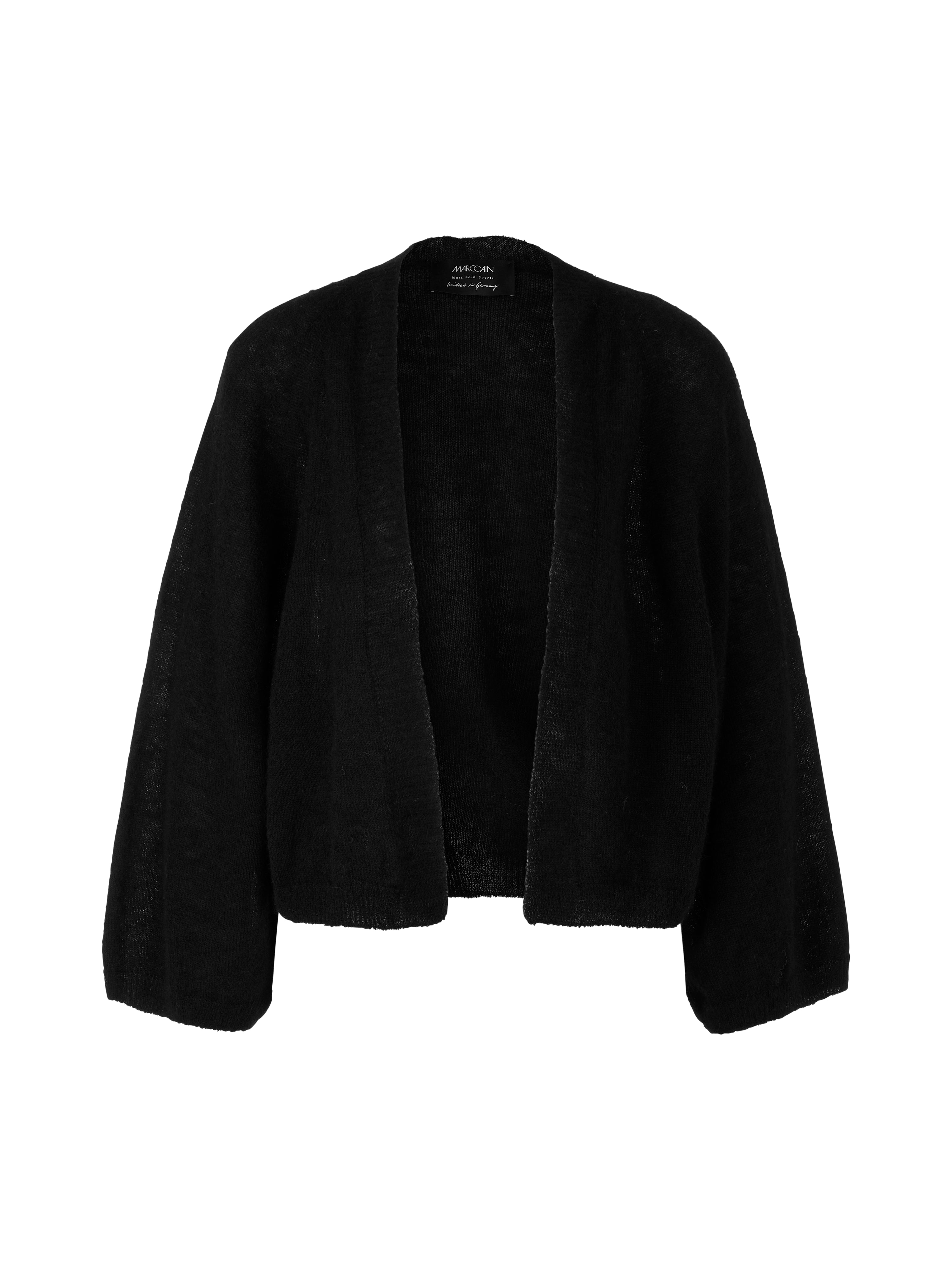 קרדיגן סרוג בגזרה ישרה, ללא סגירההרכב: 55% אלפקה, 35% פוליאמיד, 10% צמרהדוגמנית בגובה 1.79 ולובשת מידה 3 של מארק קיין